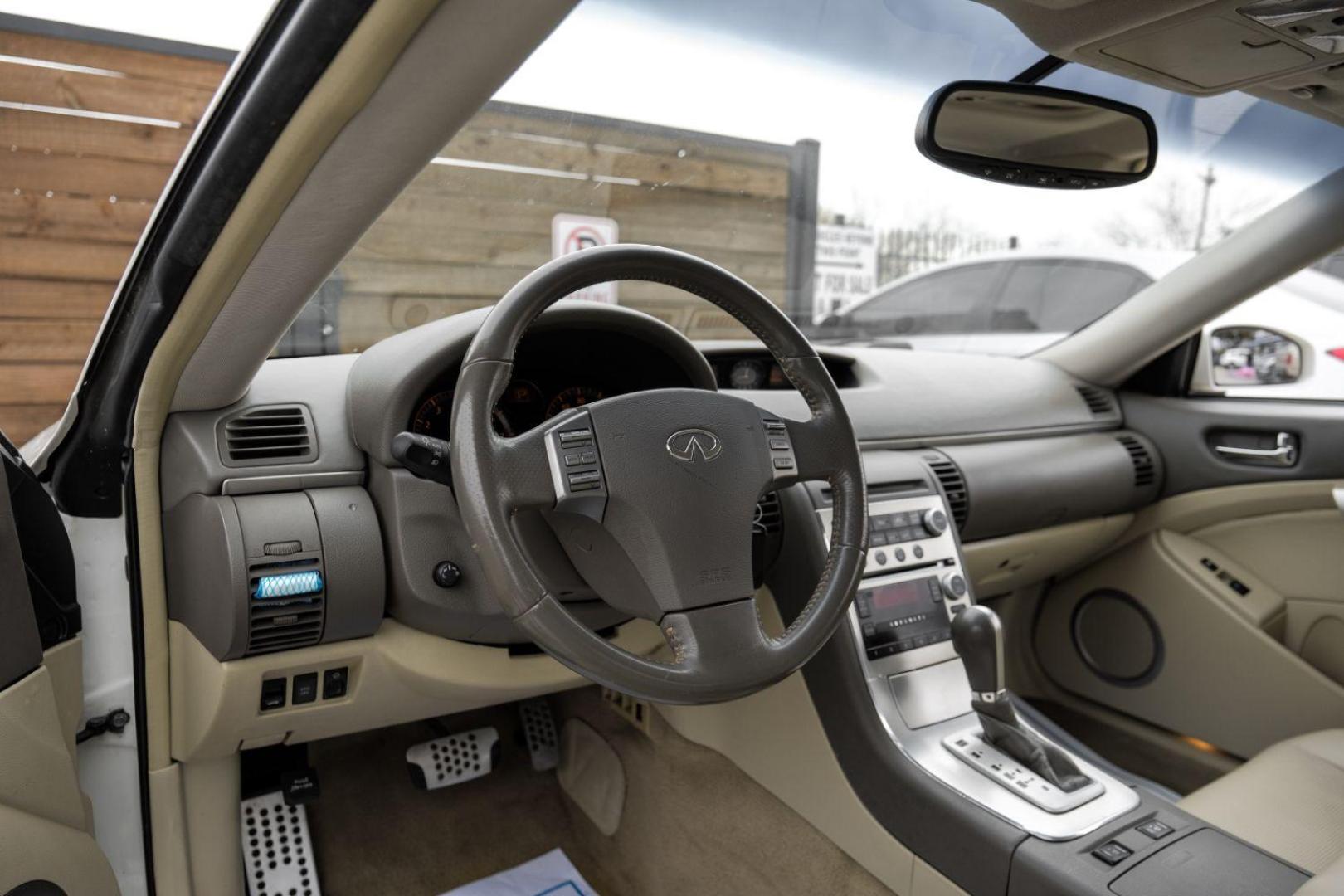 2005 WHITE Infiniti G35 Coupe (JNKCV54E55M) with an 3.5L V6 DOHC 24V engine, 5-Speed Automatic transmission, located at 2401 E Main St., Grand Prairie, TX, 75050, (972) 262-4440, 32.748981, -96.969643 - Photo#2