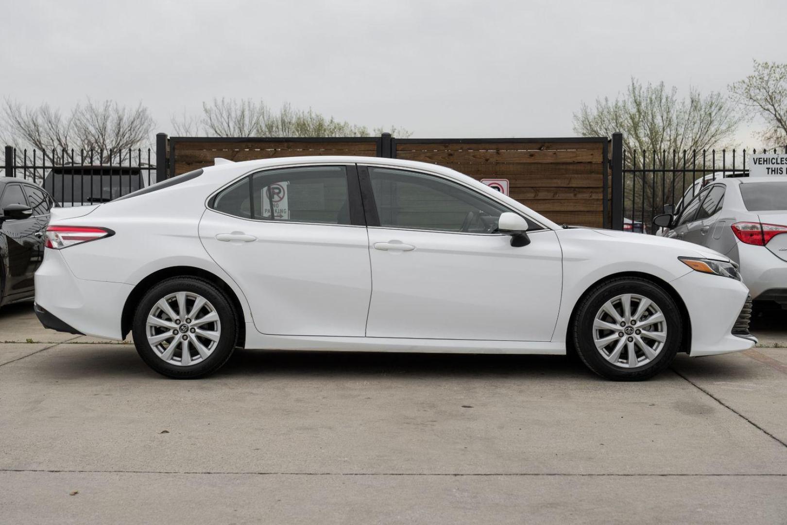 2019 White Toyota Camry LE (4T1B11HK8KU) with an 2.5L L4 DOHC 16V engine, 8-Speed Automatic transmission, located at 2401 E Main St., Grand Prairie, TX, 75050, (972) 262-4440, 32.748981, -96.969643 - Photo#8