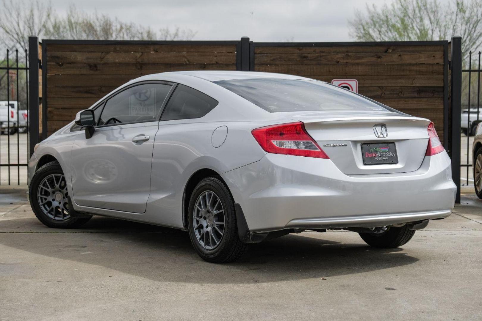 2012 Silver Honda Civic LX Coupe 5-Speed AT (2HGFG3B57CH) with an 2.3L L4 SOHC 16V engine, 5-Speed Automatic transmission, located at 2401 E Main St., Grand Prairie, TX, 75050, (972) 262-4440, 32.748981, -96.969643 - Photo#11