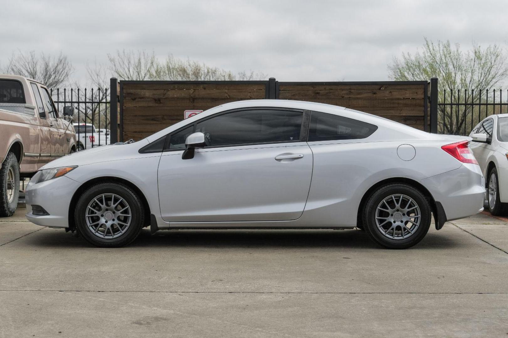 2012 Silver Honda Civic LX Coupe 5-Speed AT (2HGFG3B57CH) with an 2.3L L4 SOHC 16V engine, 5-Speed Automatic transmission, located at 2401 E Main St., Grand Prairie, TX, 75050, (972) 262-4440, 32.748981, -96.969643 - Photo#14