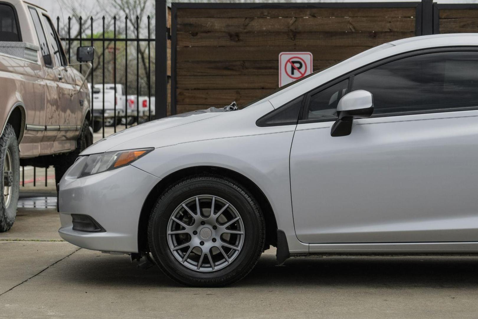 2012 Silver Honda Civic LX Coupe 5-Speed AT (2HGFG3B57CH) with an 2.3L L4 SOHC 16V engine, 5-Speed Automatic transmission, located at 2401 E Main St., Grand Prairie, TX, 75050, (972) 262-4440, 32.748981, -96.969643 - Photo#15