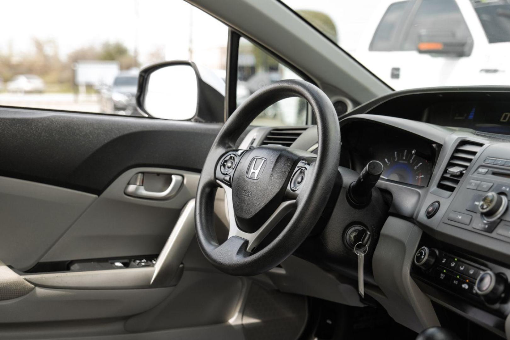 2012 Silver Honda Civic LX Coupe 5-Speed AT (2HGFG3B57CH) with an 2.3L L4 SOHC 16V engine, 5-Speed Automatic transmission, located at 2401 E Main St., Grand Prairie, TX, 75050, (972) 262-4440, 32.748981, -96.969643 - Photo#18