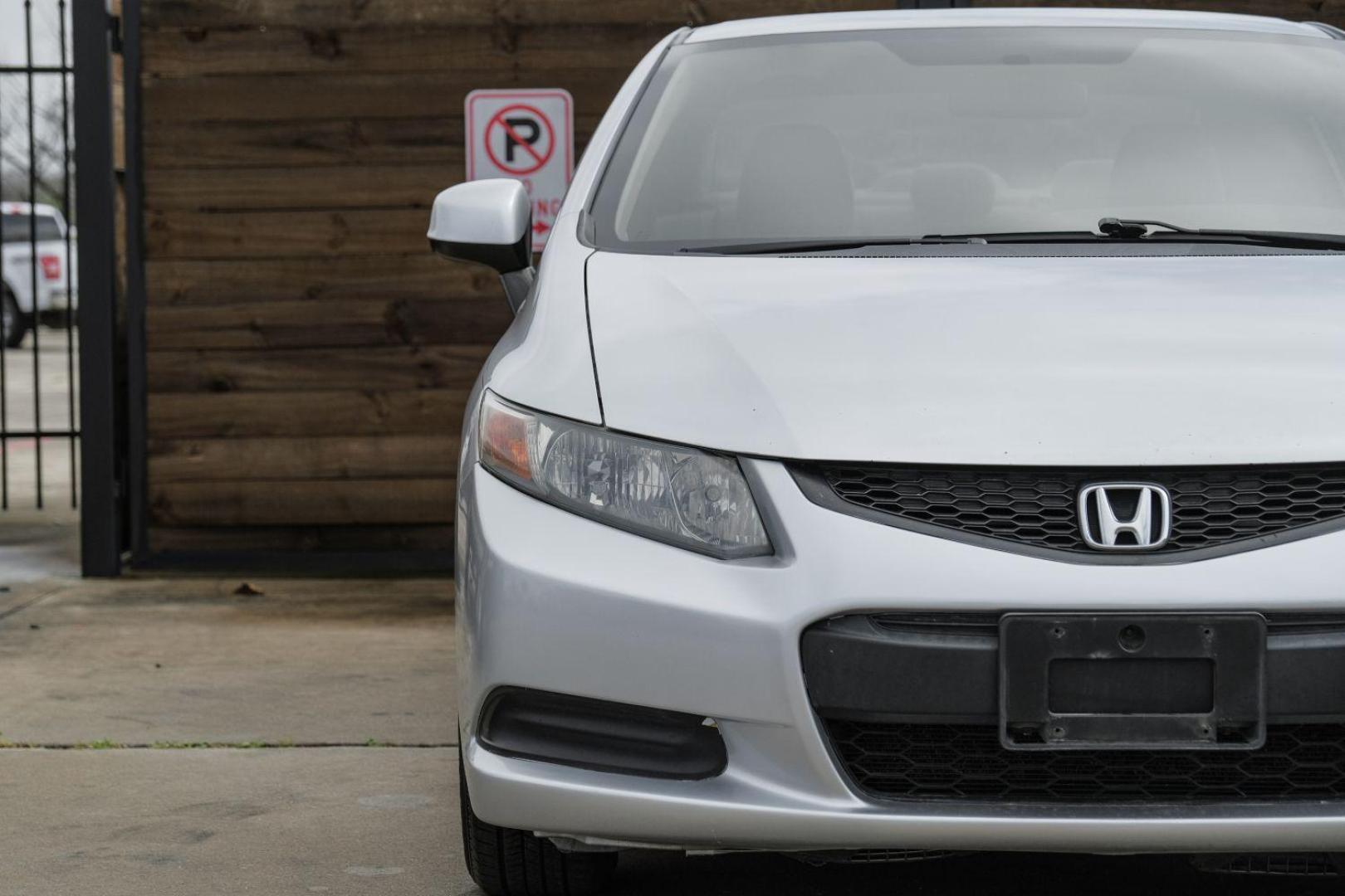 2012 Silver Honda Civic LX Coupe 5-Speed AT (2HGFG3B57CH) with an 2.3L L4 SOHC 16V engine, 5-Speed Automatic transmission, located at 2401 E Main St., Grand Prairie, TX, 75050, (972) 262-4440, 32.748981, -96.969643 - Photo#38