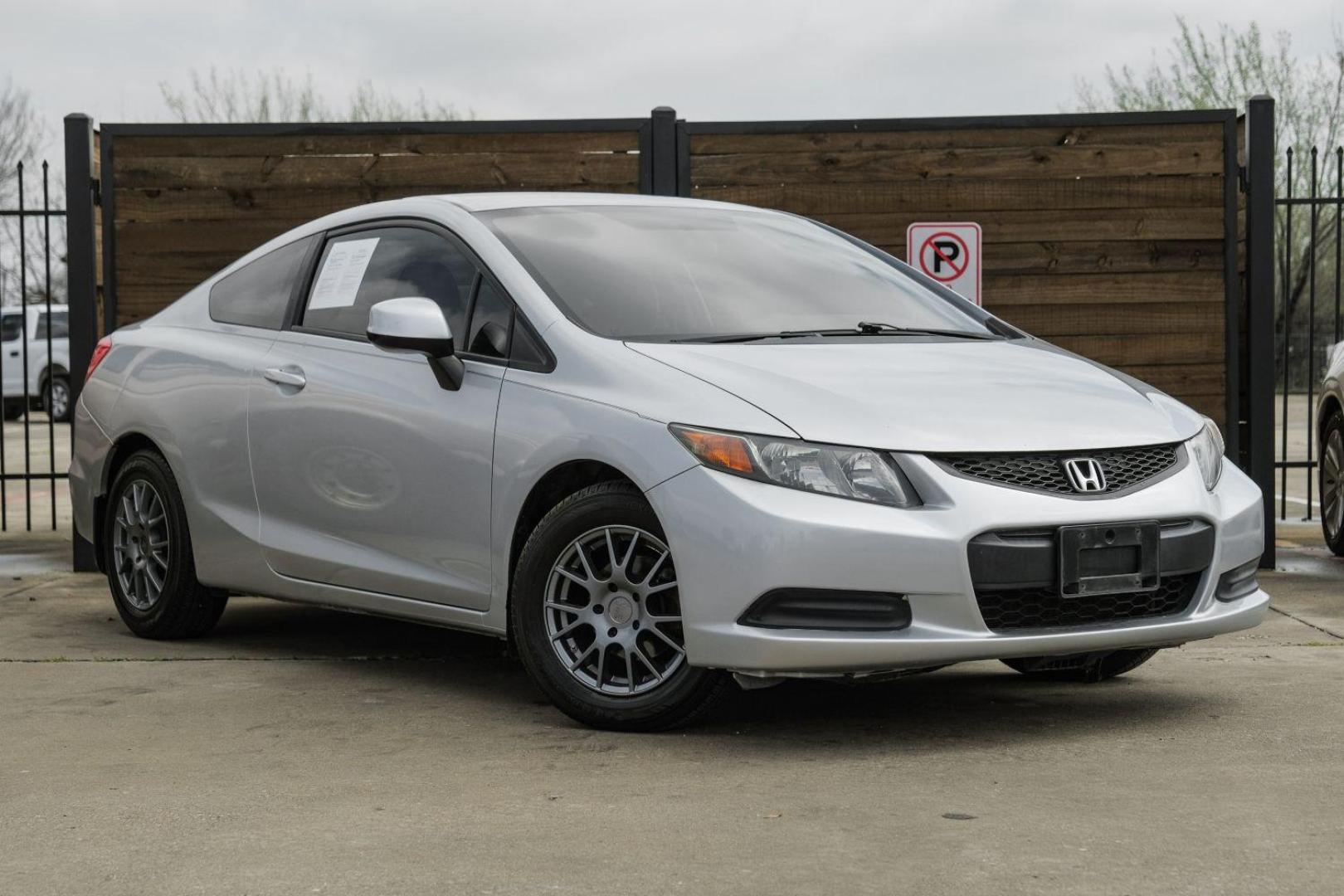 2012 Silver Honda Civic LX Coupe 5-Speed AT (2HGFG3B57CH) with an 2.3L L4 SOHC 16V engine, 5-Speed Automatic transmission, located at 2401 E Main St., Grand Prairie, TX, 75050, (972) 262-4440, 32.748981, -96.969643 - Photo#5