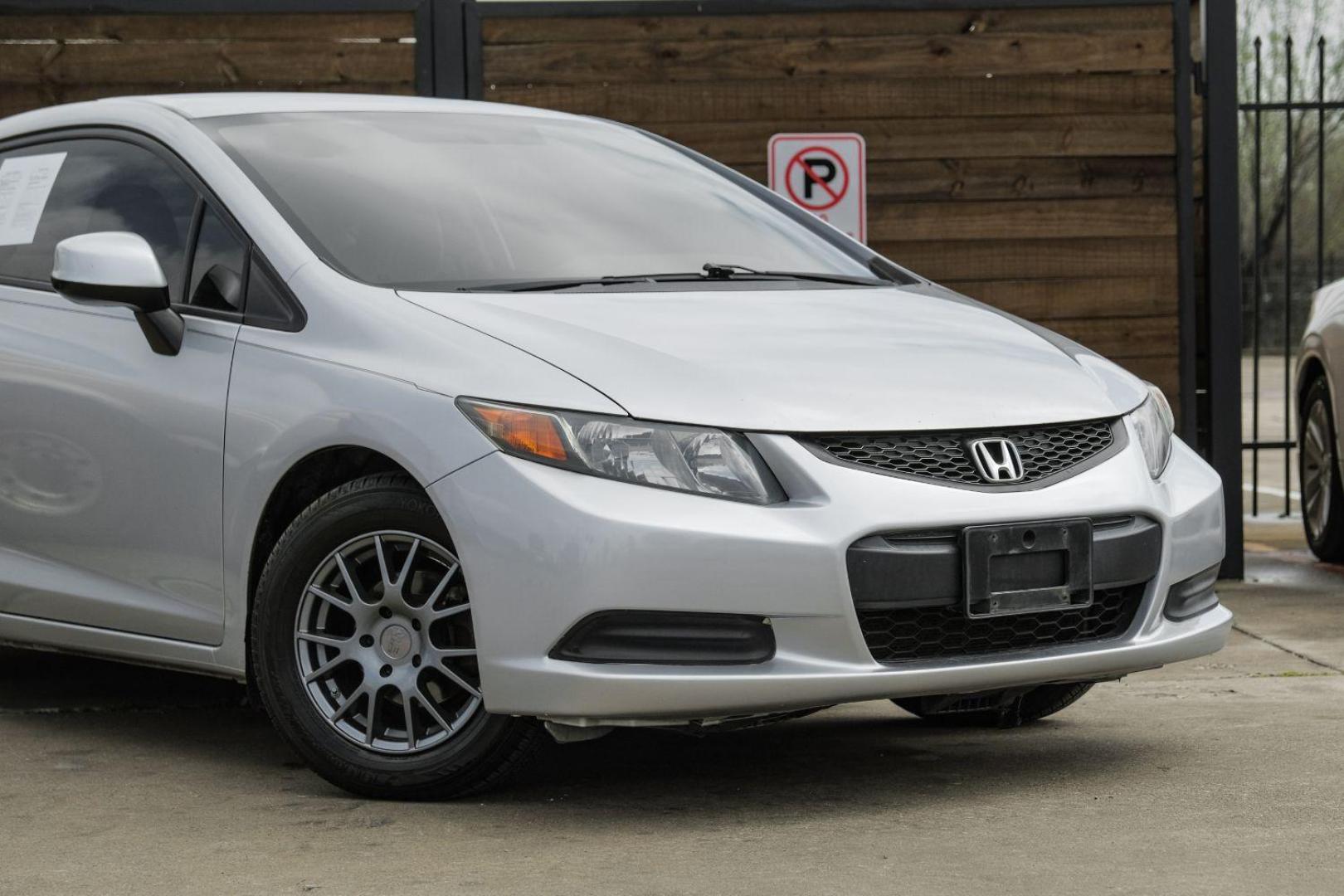 2012 Silver Honda Civic LX Coupe 5-Speed AT (2HGFG3B57CH) with an 2.3L L4 SOHC 16V engine, 5-Speed Automatic transmission, located at 2401 E Main St., Grand Prairie, TX, 75050, (972) 262-4440, 32.748981, -96.969643 - Photo#7