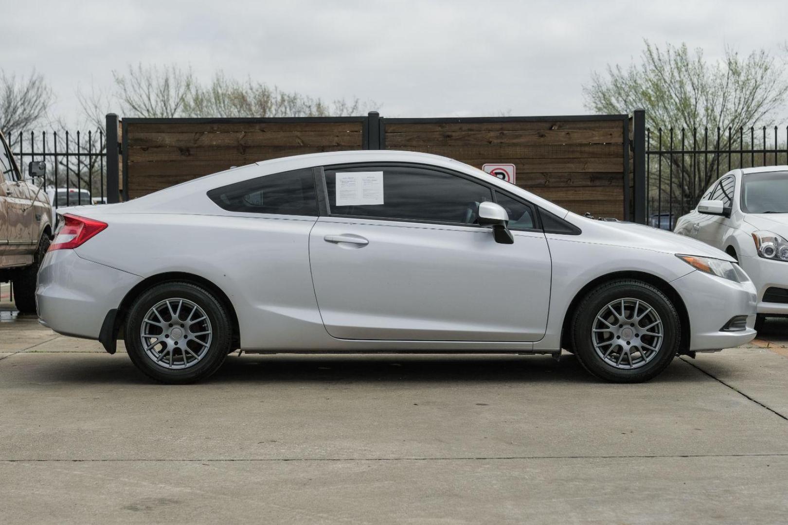 2012 Silver Honda Civic LX Coupe 5-Speed AT (2HGFG3B57CH) with an 2.3L L4 SOHC 16V engine, 5-Speed Automatic transmission, located at 2401 E Main St., Grand Prairie, TX, 75050, (972) 262-4440, 32.748981, -96.969643 - Photo#8