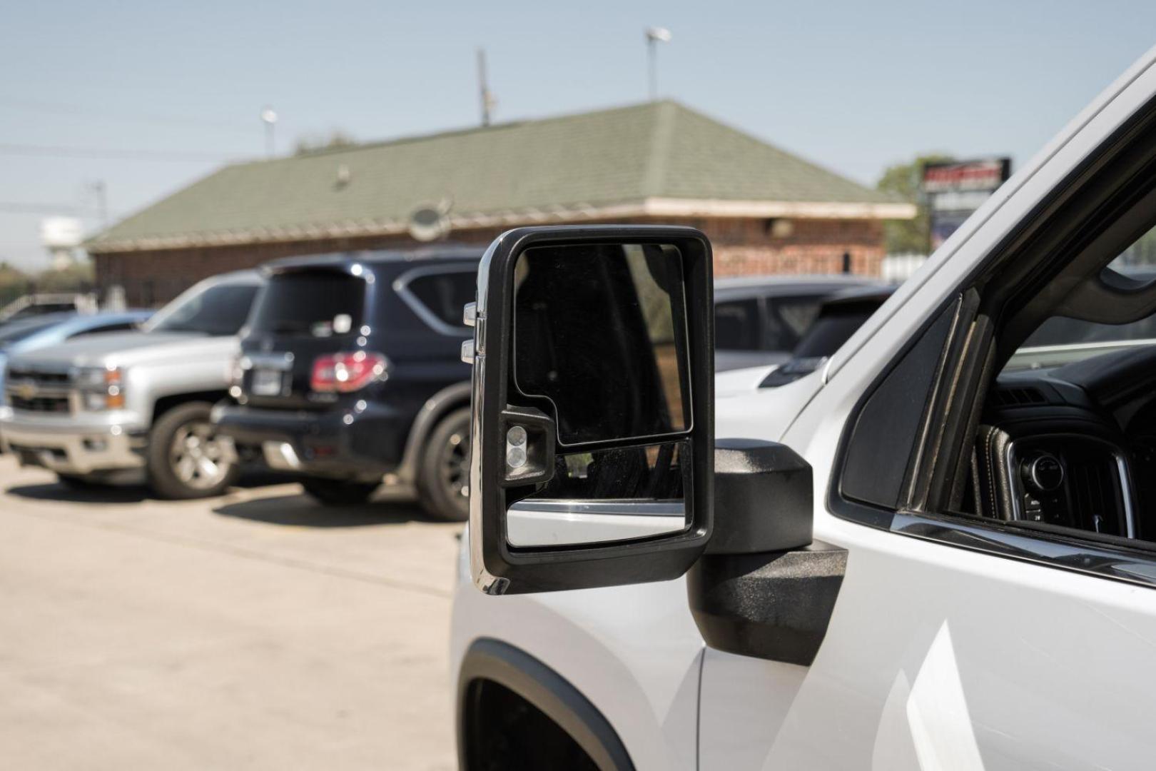 2020 White Chevrolet Silverado 3500HD LTZ Crew Cab 4WD (1GC4YUEY5LF) with an 6.6L V8 OHV 32V TURBO DIESEL engine, 6-Speed Automatic transmission, located at 2401 E Main St., Grand Prairie, TX, 75050, (972) 262-4440, 32.748981, -96.969643 - Photo#43