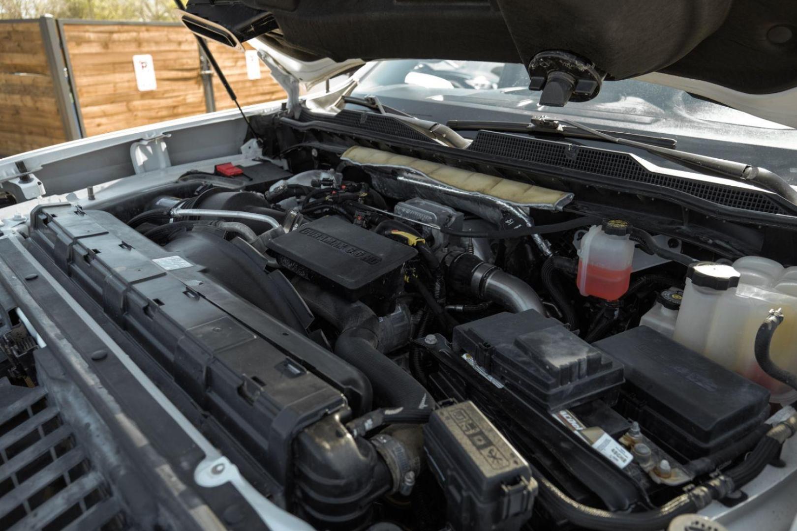 2020 White Chevrolet Silverado 3500HD LTZ Crew Cab 4WD (1GC4YUEY5LF) with an 6.6L V8 OHV 32V TURBO DIESEL engine, 6-Speed Automatic transmission, located at 2401 E Main St., Grand Prairie, TX, 75050, (972) 262-4440, 32.748981, -96.969643 - Photo#51