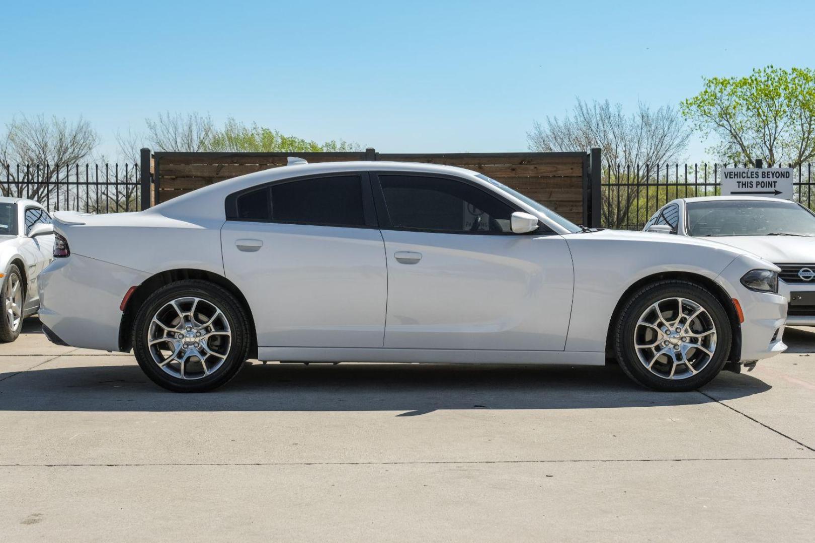 2015 White Dodge Charger SXT AWD (2C3CDXJG9FH) with an 3.6L V6 DOHC 24V engine, 8-Speed Automatic transmission, located at 2401 E Main St., Grand Prairie, TX, 75050, (972) 262-4440, 32.748981, -96.969643 - Photo#9