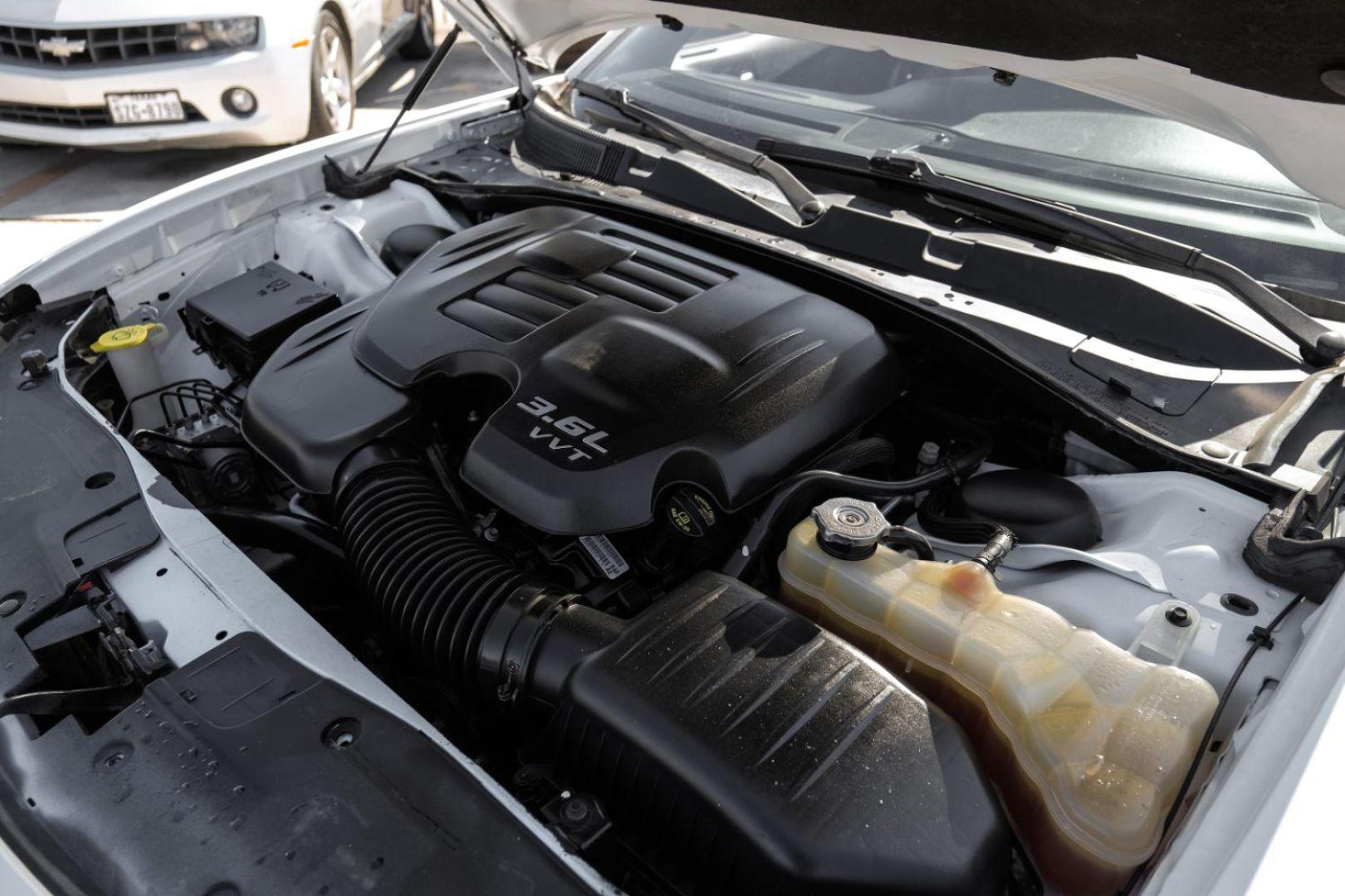 2015 White Dodge Charger SXT AWD (2C3CDXJG9FH) with an 3.6L V6 DOHC 24V engine, 8-Speed Automatic transmission, located at 2401 E Main St., Grand Prairie, TX, 75050, (972) 262-4440, 32.748981, -96.969643 - Photo#51