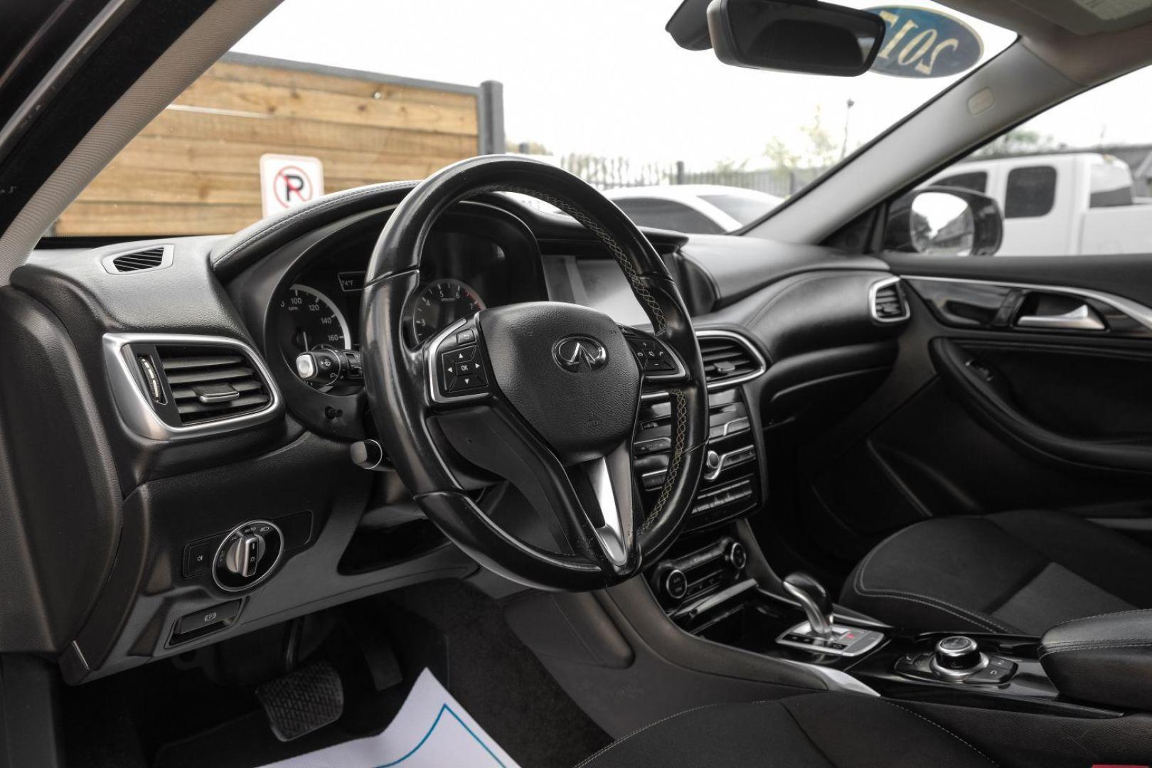 2017 BLACK Infiniti QX30 Base (SJKCH5CPXHA) with an 2.0L L4 DOHC 16V engine, 7-Speed Automatic transmission, located at 2401 E Main St., Grand Prairie, TX, 75050, (972) 262-4440, 32.748981, -96.969643 - Photo#2