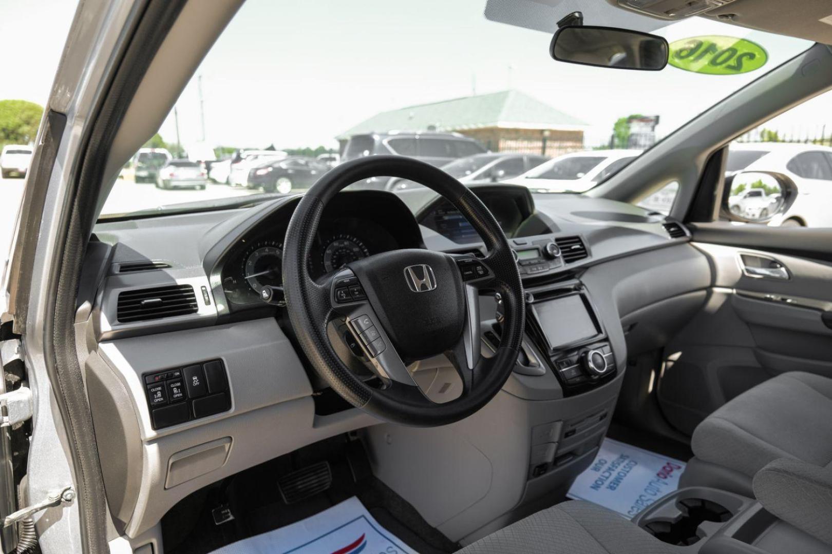 2016 Silver Honda Odyssey SE (5FNRL5H30GB) with an 3.5L V6 SOHC 24V engine, 6-Speed Automatic transmission, located at 2401 E Main St., Grand Prairie, TX, 75050, (972) 262-4440, 32.748981, -96.969643 - Photo#2