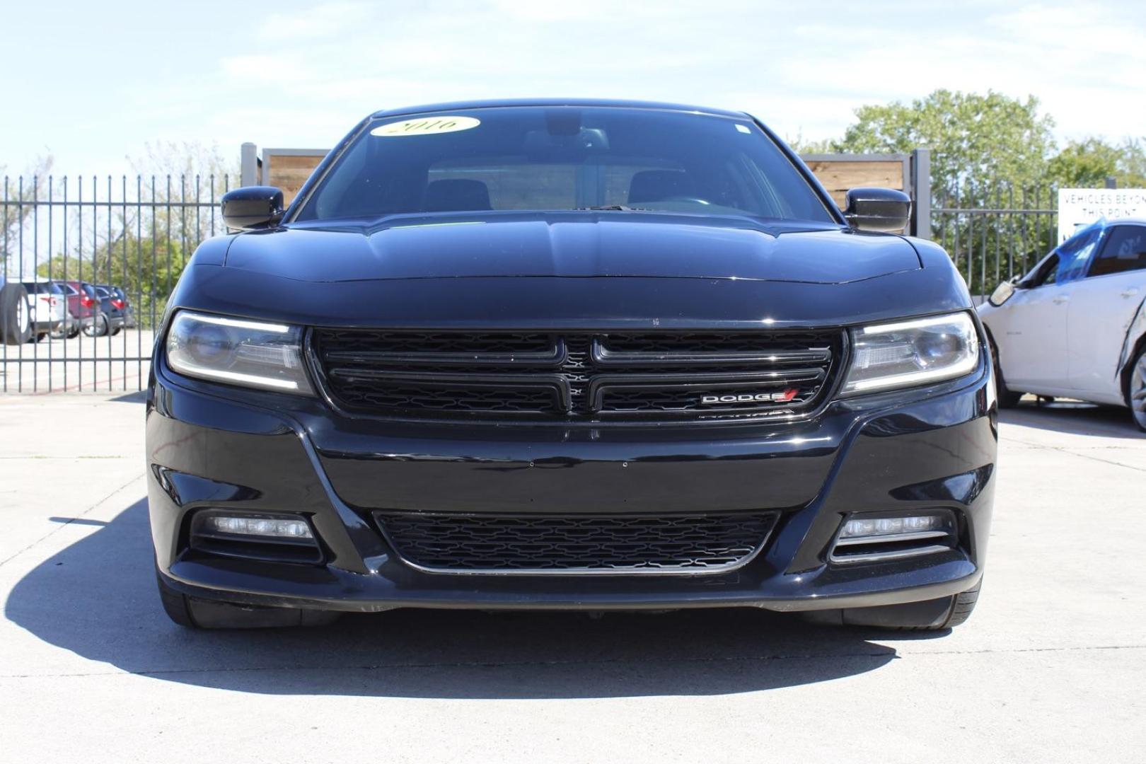 2016 BLACK Dodge Charger SXT (2C3CDXHG8GH) with an 3.6L V6 DOHC 24V engine, 8-Speed Automatic transmission, located at 2401 E Main St., Grand Prairie, TX, 75050, (972) 262-4440, 32.748981, -96.969643 - Photo#0