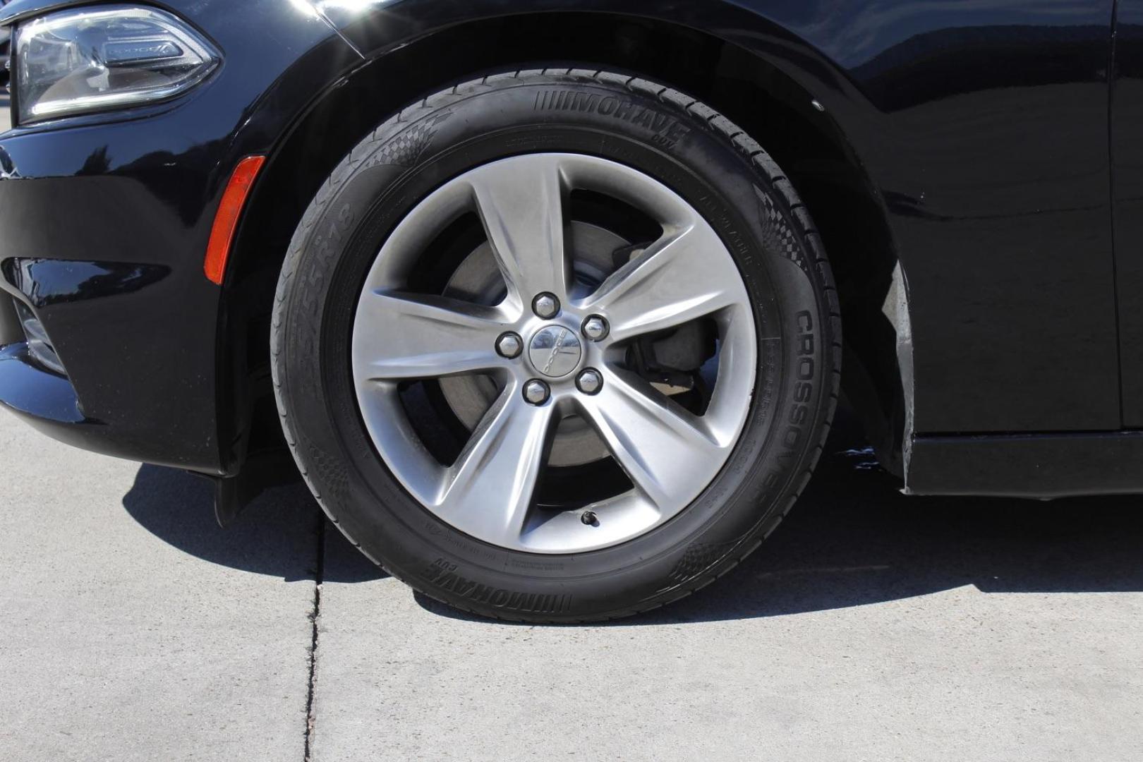 2016 BLACK Dodge Charger SXT (2C3CDXHG8GH) with an 3.6L V6 DOHC 24V engine, 8-Speed Automatic transmission, located at 2401 E Main St., Grand Prairie, TX, 75050, (972) 262-4440, 32.748981, -96.969643 - Photo#3