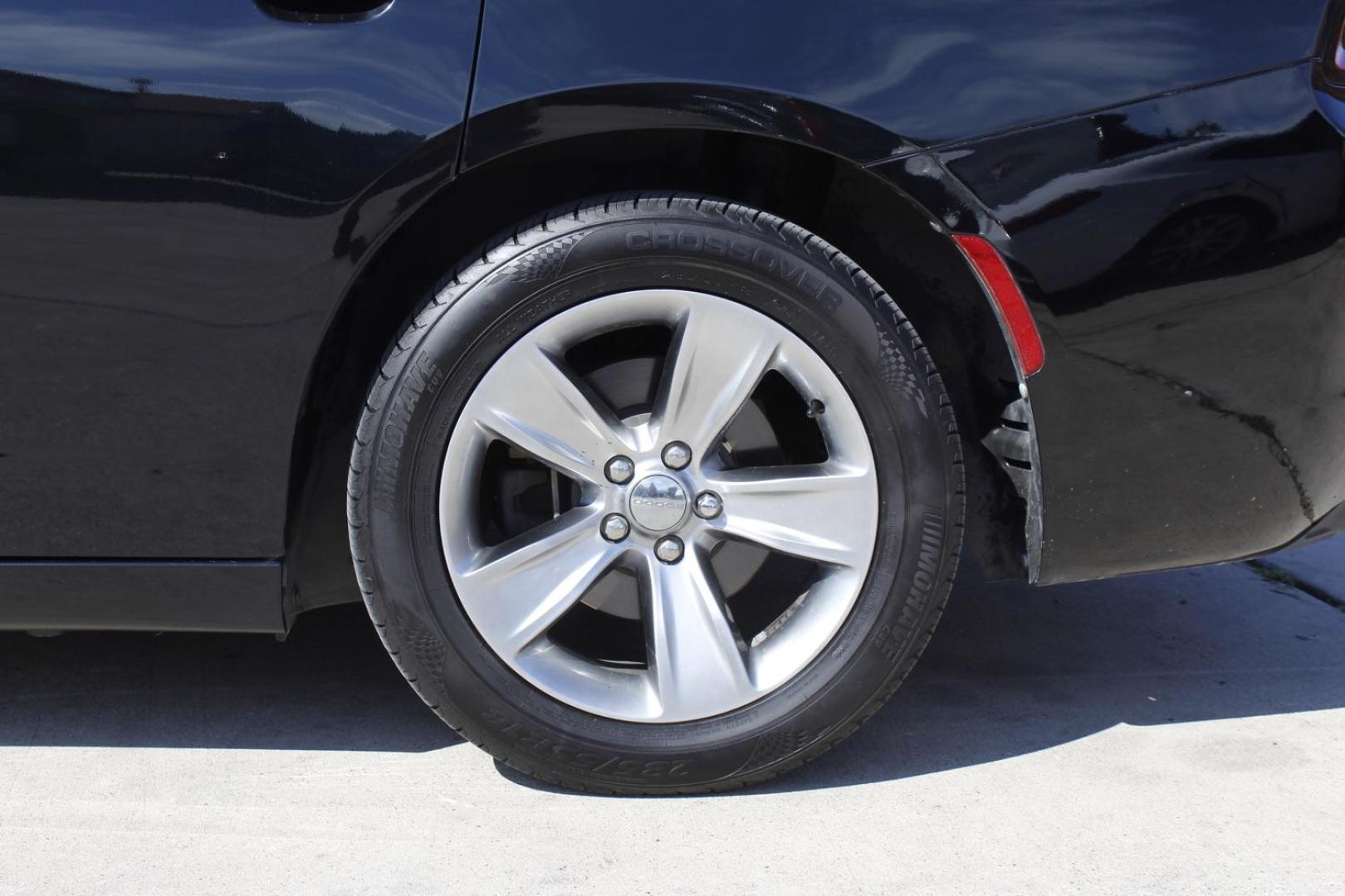 2016 BLACK Dodge Charger SXT (2C3CDXHG8GH) with an 3.6L V6 DOHC 24V engine, 8-Speed Automatic transmission, located at 2401 E Main St., Grand Prairie, TX, 75050, (972) 262-4440, 32.748981, -96.969643 - Photo#4