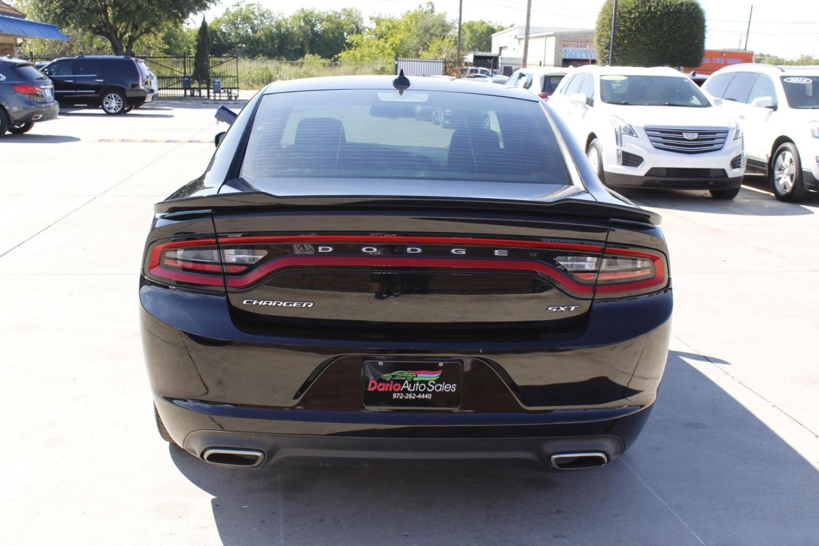 2016 BLACK Dodge Charger SXT (2C3CDXHG8GH) with an 3.6L V6 DOHC 24V engine, 8-Speed Automatic transmission, located at 2401 E Main St., Grand Prairie, TX, 75050, (972) 262-4440, 32.748981, -96.969643 - Photo#5