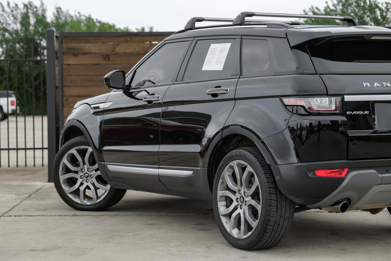 2015 black Land Rover Range Rover Evoque Prestige Premium 5-Door (SALVV2BG8FH) with an 2.0L L4 DOHC 24V TURBO engine, 9-Speed Automatic transmission, located at 2401 E Main St., Grand Prairie, TX, 75050, (972) 262-4440, 32.748981, -96.969643 - Photo#13