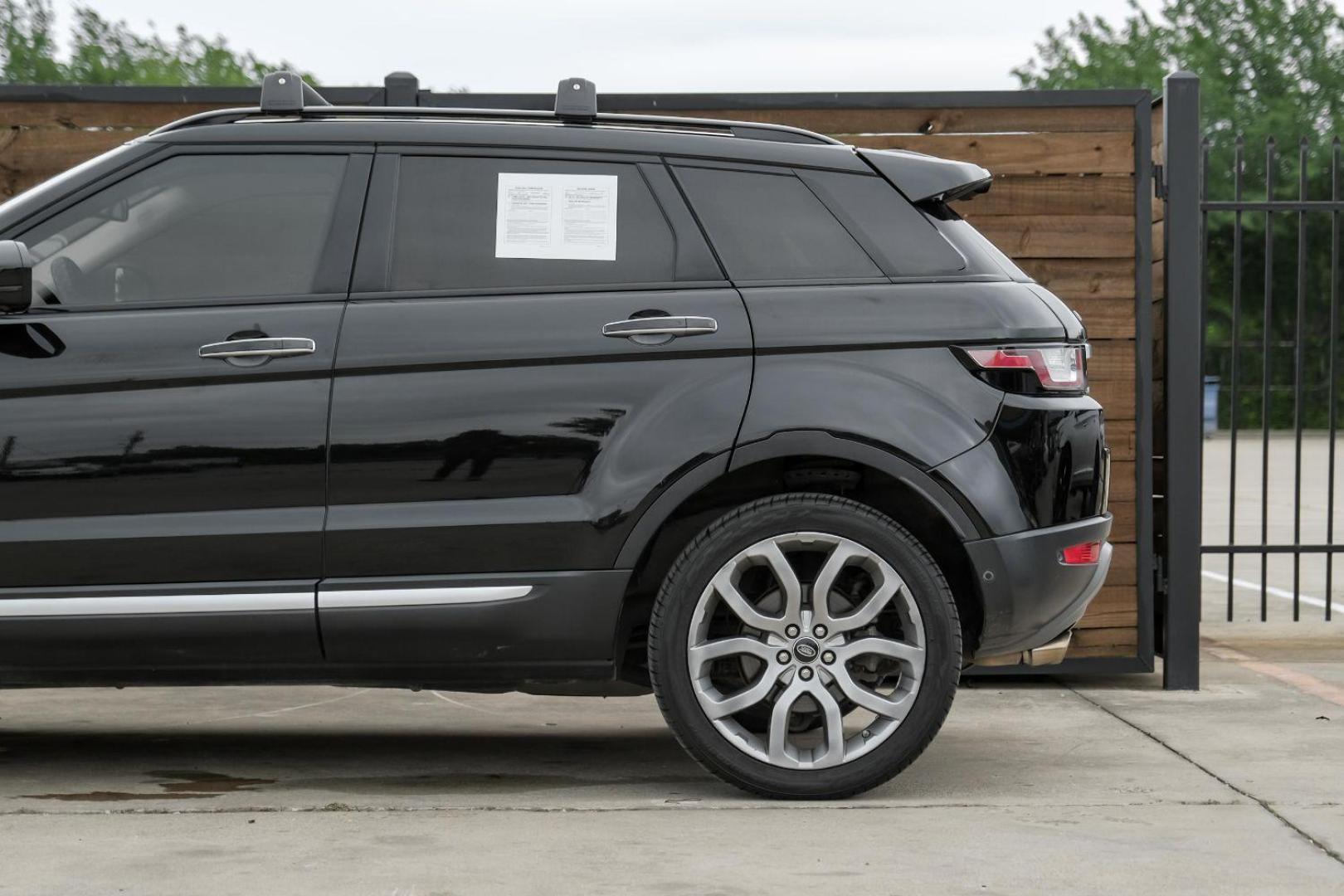 2015 black Land Rover Range Rover Evoque Prestige Premium 5-Door (SALVV2BG8FH) with an 2.0L L4 DOHC 24V TURBO engine, 9-Speed Automatic transmission, located at 2401 E Main St., Grand Prairie, TX, 75050, (972) 262-4440, 32.748981, -96.969643 - Photo#17