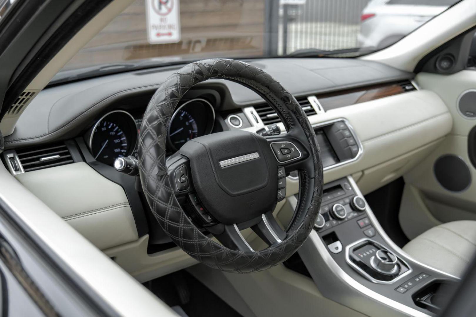 2015 black Land Rover Range Rover Evoque Prestige Premium 5-Door (SALVV2BG8FH) with an 2.0L L4 DOHC 24V TURBO engine, 9-Speed Automatic transmission, located at 2401 E Main St., Grand Prairie, TX, 75050, (972) 262-4440, 32.748981, -96.969643 - Photo#21