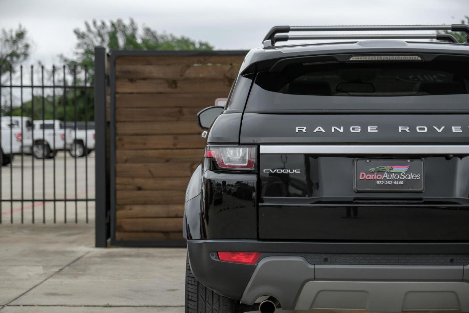 2015 black Land Rover Range Rover Evoque Prestige Premium 5-Door (SALVV2BG8FH) with an 2.0L L4 DOHC 24V TURBO engine, 9-Speed Automatic transmission, located at 2401 E Main St., Grand Prairie, TX, 75050, (972) 262-4440, 32.748981, -96.969643 - Photo#50