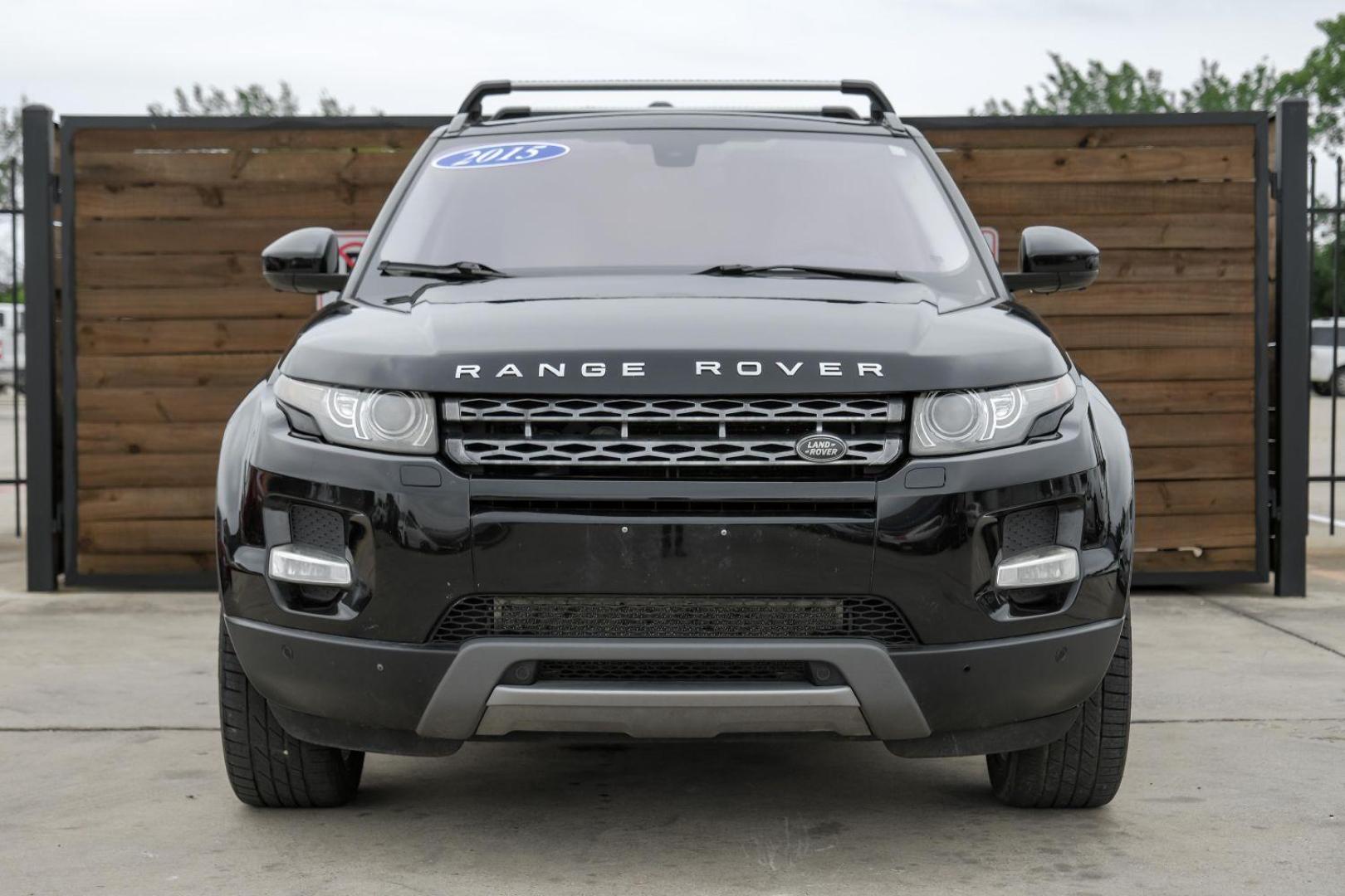 2015 black Land Rover Range Rover Evoque Prestige Premium 5-Door (SALVV2BG8FH) with an 2.0L L4 DOHC 24V TURBO engine, 9-Speed Automatic transmission, located at 2401 E Main St., Grand Prairie, TX, 75050, (972) 262-4440, 32.748981, -96.969643 - Photo#5