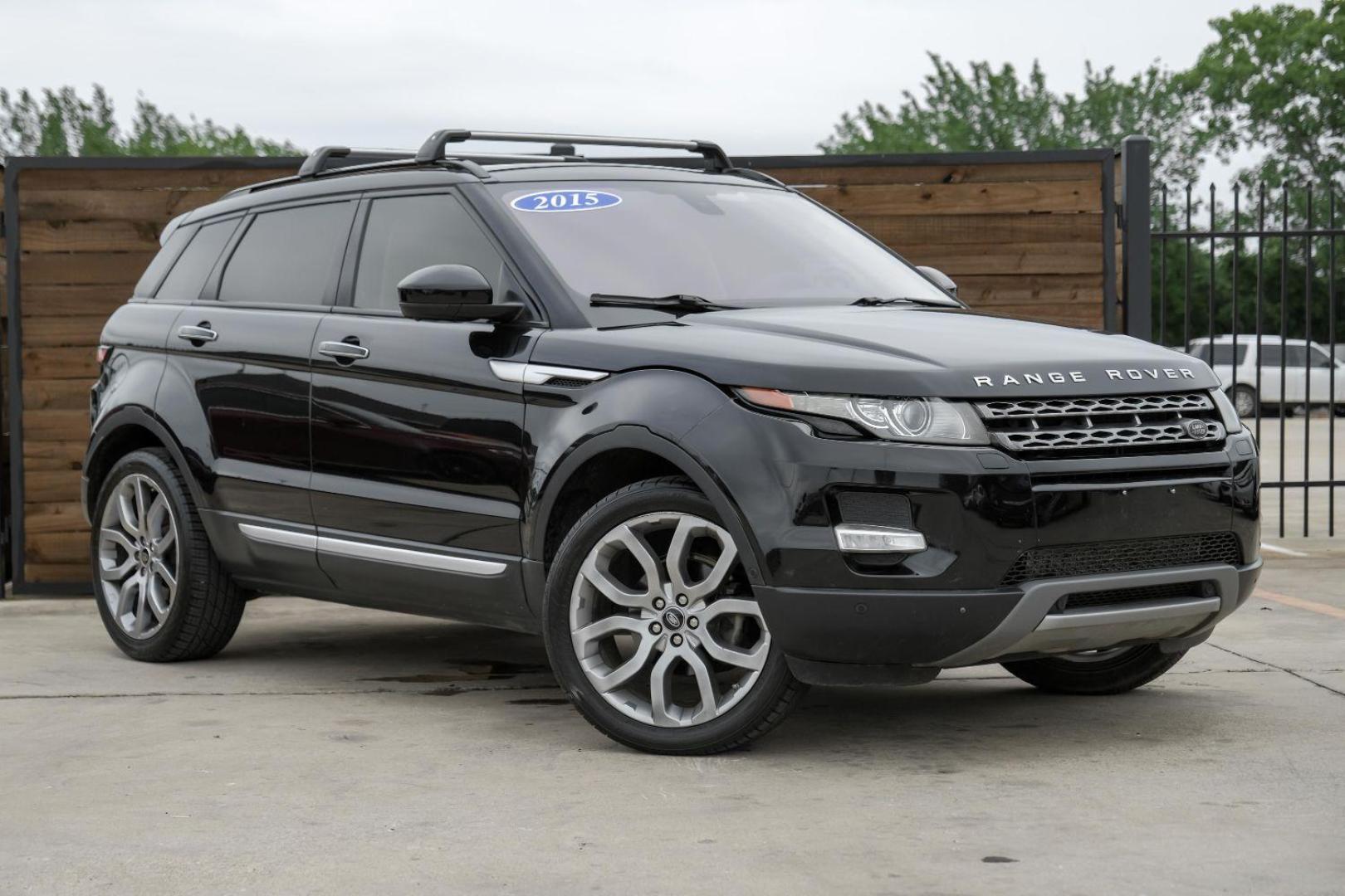 2015 black Land Rover Range Rover Evoque Prestige Premium 5-Door (SALVV2BG8FH) with an 2.0L L4 DOHC 24V TURBO engine, 9-Speed Automatic transmission, located at 2401 E Main St., Grand Prairie, TX, 75050, (972) 262-4440, 32.748981, -96.969643 - Photo#6