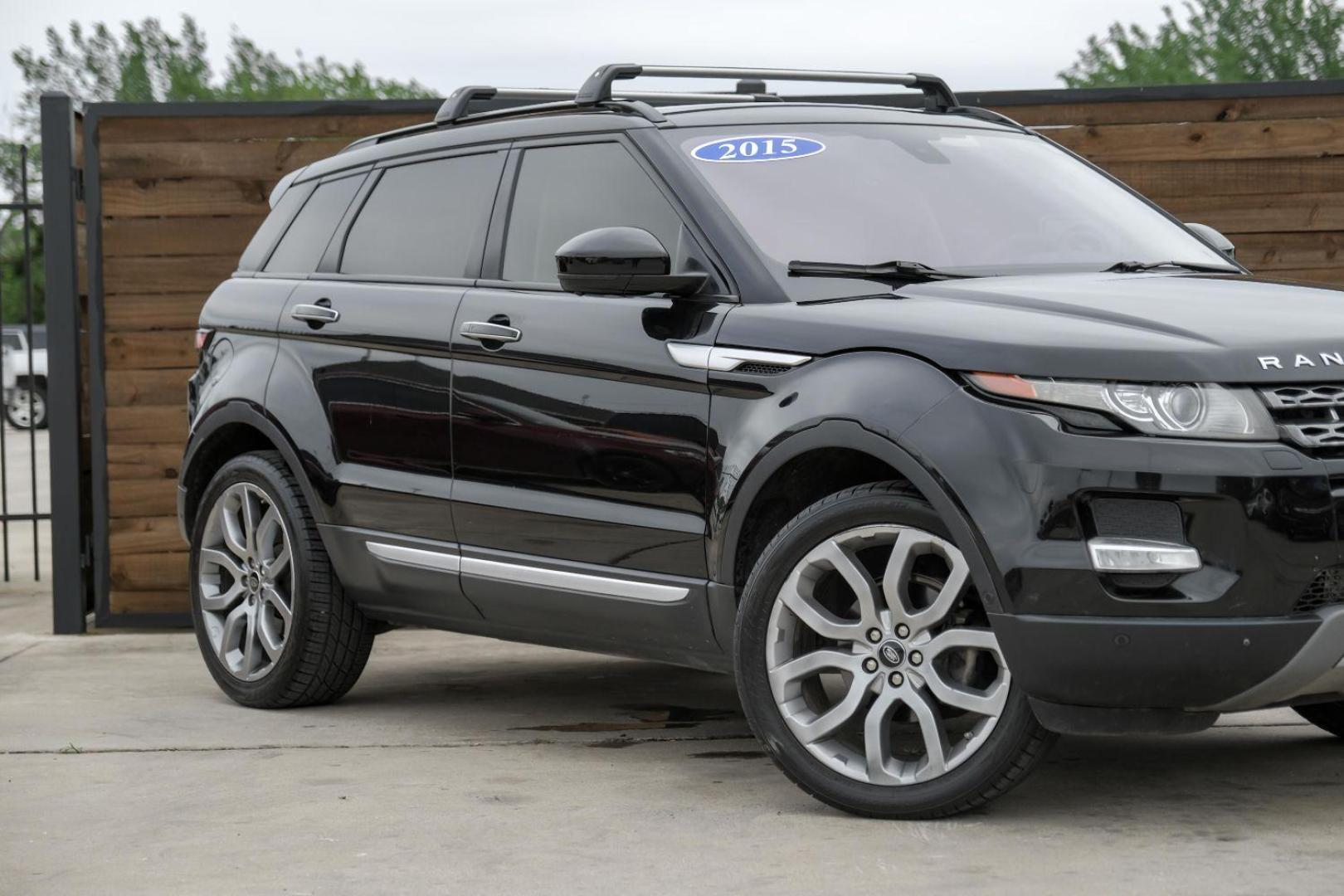 2015 black Land Rover Range Rover Evoque Prestige Premium 5-Door (SALVV2BG8FH) with an 2.0L L4 DOHC 24V TURBO engine, 9-Speed Automatic transmission, located at 2401 E Main St., Grand Prairie, TX, 75050, (972) 262-4440, 32.748981, -96.969643 - Photo#7