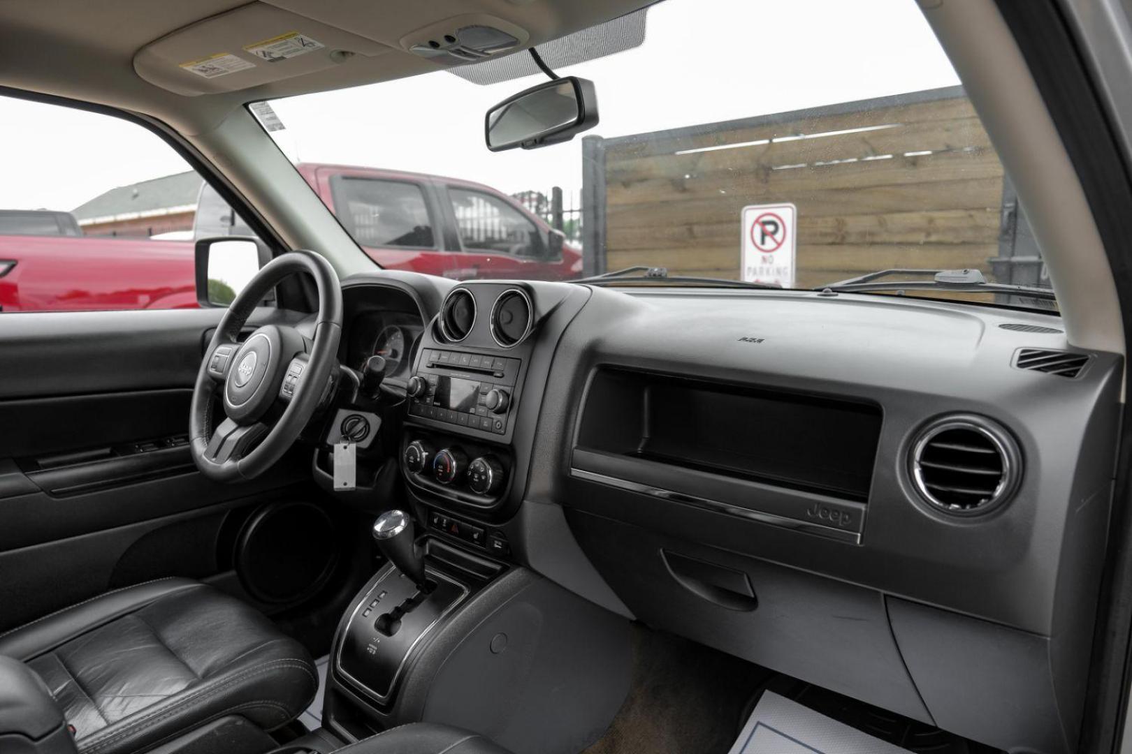 2016 Silver Jeep Patriot Latitude 2WD (1C4NJPFA8GD) with an 2.0L L4 DOHC 16V engine, located at 2401 E Main St., Grand Prairie, TX, 75050, (972) 262-4440, 32.748981, -96.969643 - Photo#18