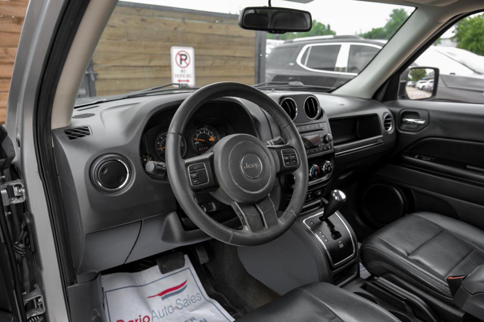 2016 Silver Jeep Patriot Latitude 2WD (1C4NJPFA8GD) with an 2.0L L4 DOHC 16V engine, located at 2401 E Main St., Grand Prairie, TX, 75050, (972) 262-4440, 32.748981, -96.969643 - Photo#2