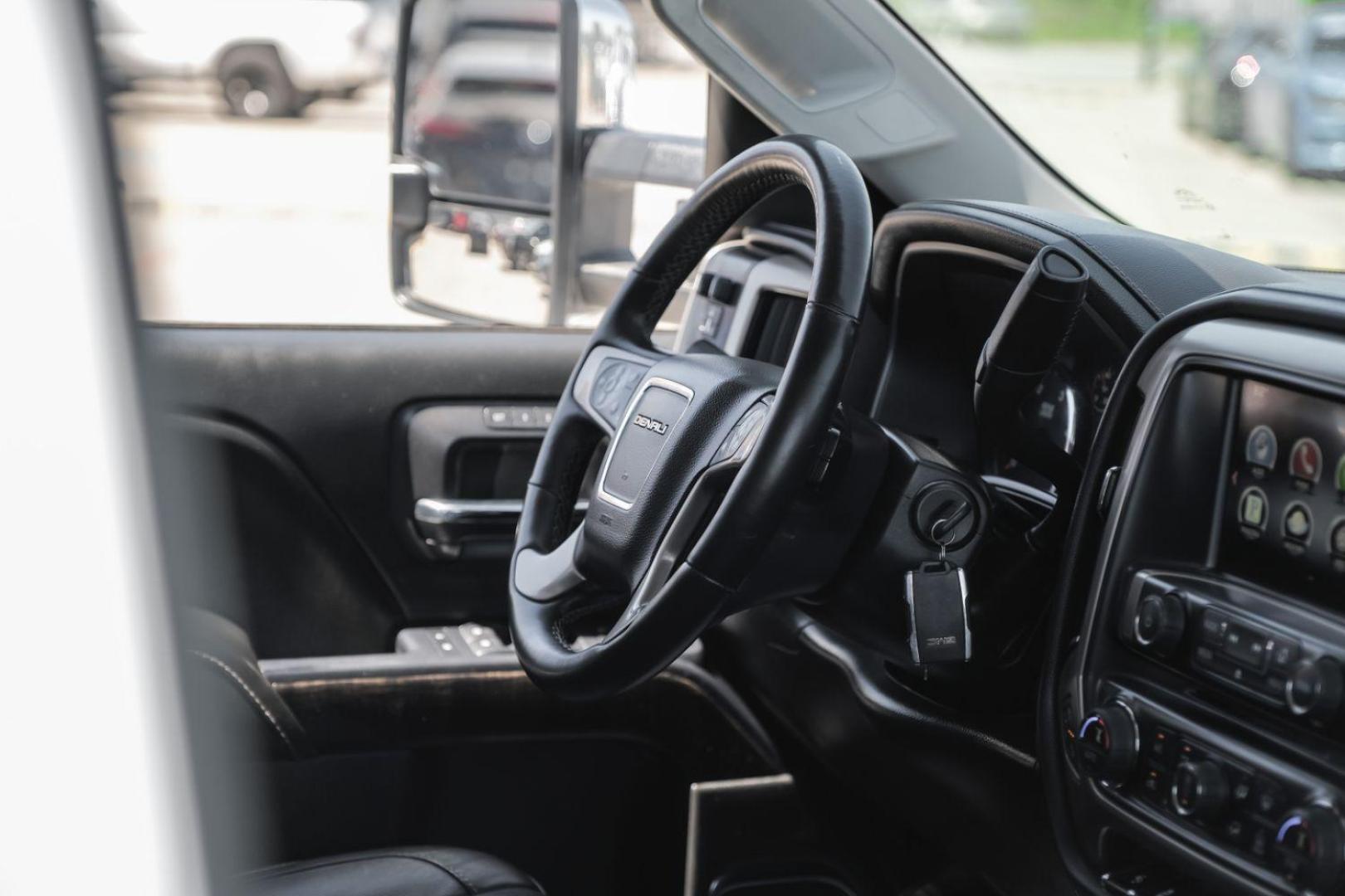 2015 White GMC Sierra 2500HD Denali Crew Cab 4WD (1GT120E80FF) with an 6.6L V8 OHV 16V DIESEL engine, 6-Speed Automatic transmission, located at 2401 E Main St., Grand Prairie, TX, 75050, (972) 262-4440, 32.748981, -96.969643 - Photo#19