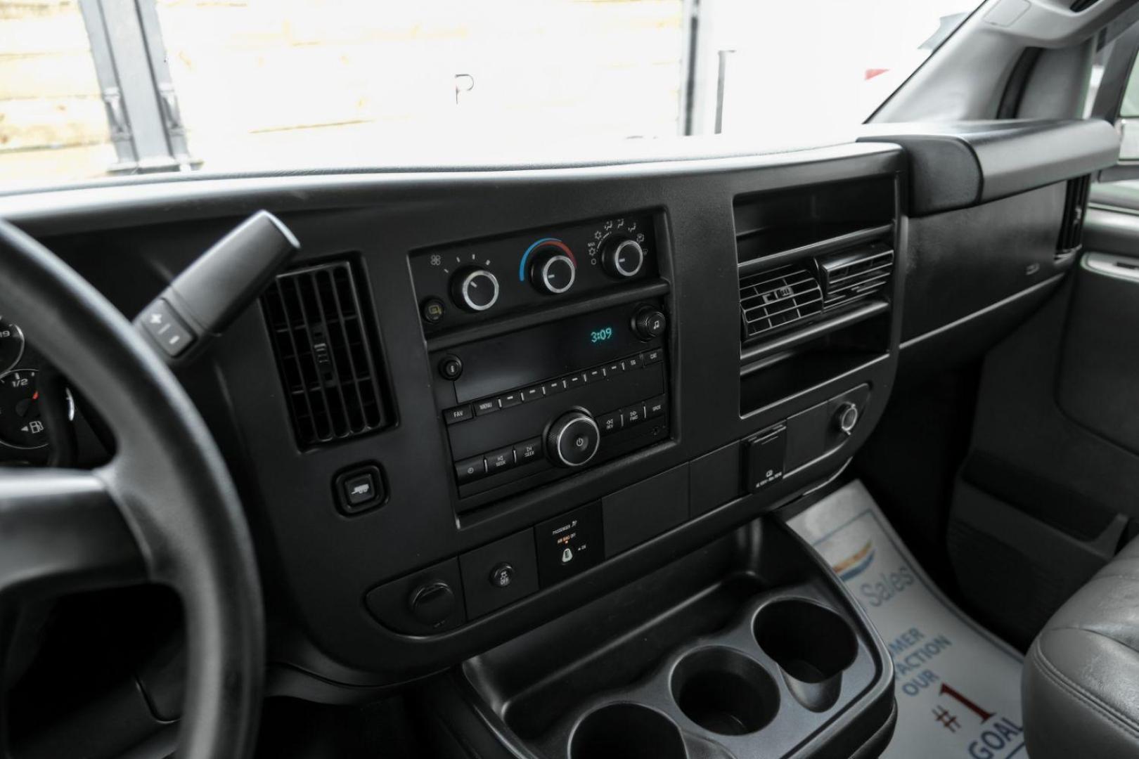 2016 RED Chevrolet Express 2500 Cargo (1GCWGAFF9G1) with an 4.8L V8 FFV engine, 6-Speed Automatic transmission, located at 2401 E Main St., Grand Prairie, TX, 75050, (972) 262-4440, 32.748981, -96.969643 - Photo#23