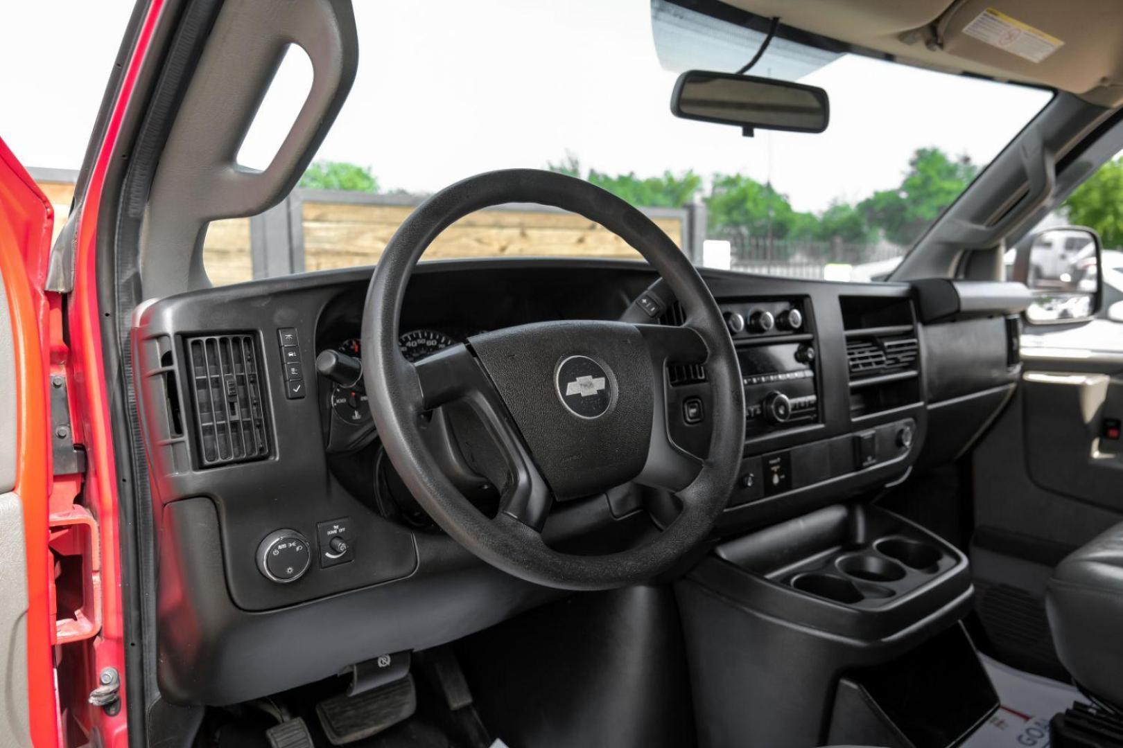 2016 RED Chevrolet Express 2500 Cargo (1GCWGAFF9G1) with an 4.8L V8 FFV engine, 6-Speed Automatic transmission, located at 2401 E Main St., Grand Prairie, TX, 75050, (972) 262-4440, 32.748981, -96.969643 - Photo#2