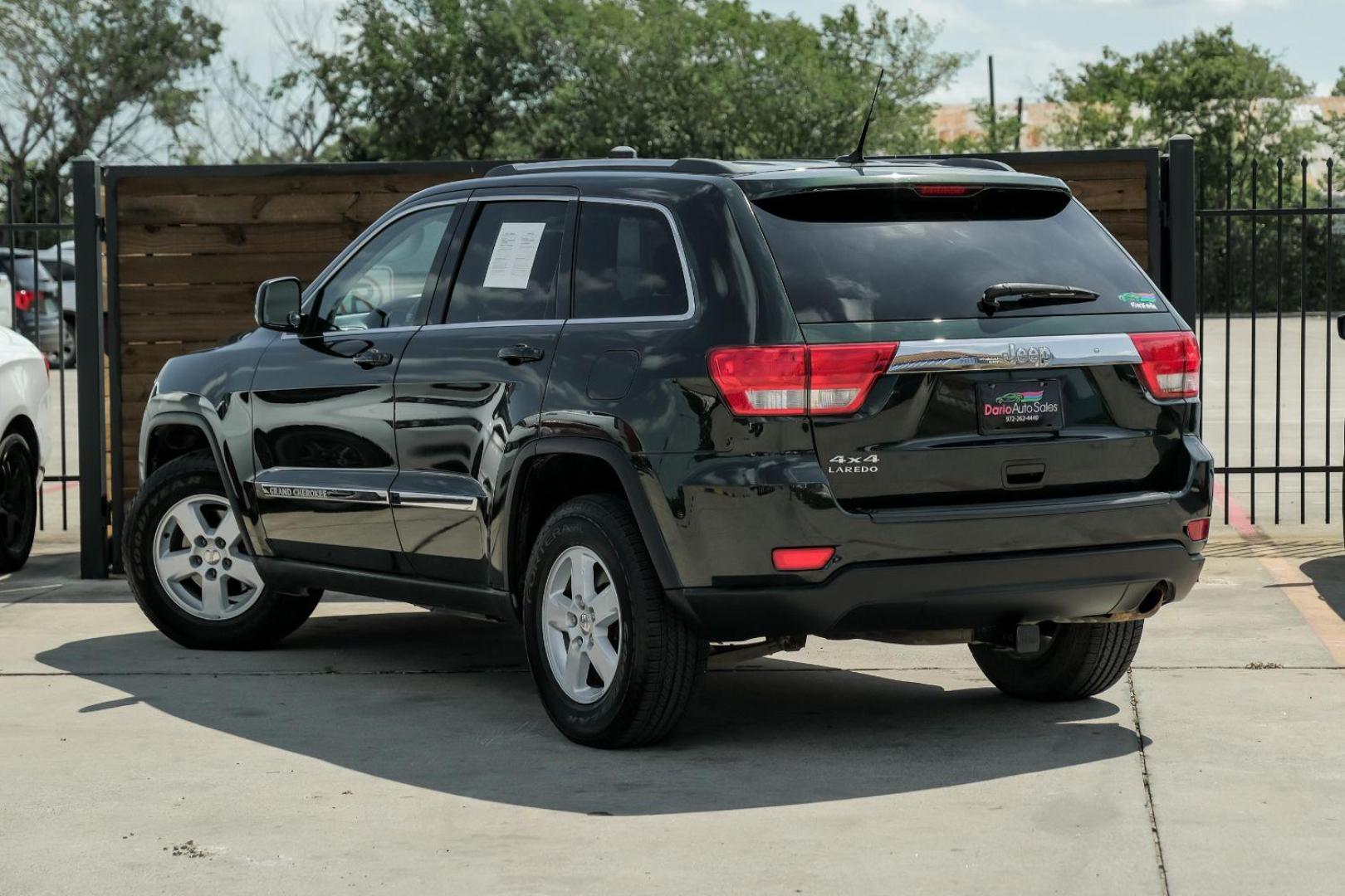 2011 GREEN Jeep Grand Cherokee Laredo 4WD (1J4RR4GG1BC) with an 3.6L V6 DOHC 24V engine, 5-Speed Automatic transmission, located at 2401 E Main St., Grand Prairie, TX, 75050, (972) 262-4440, 32.748981, -96.969643 - Photo#11