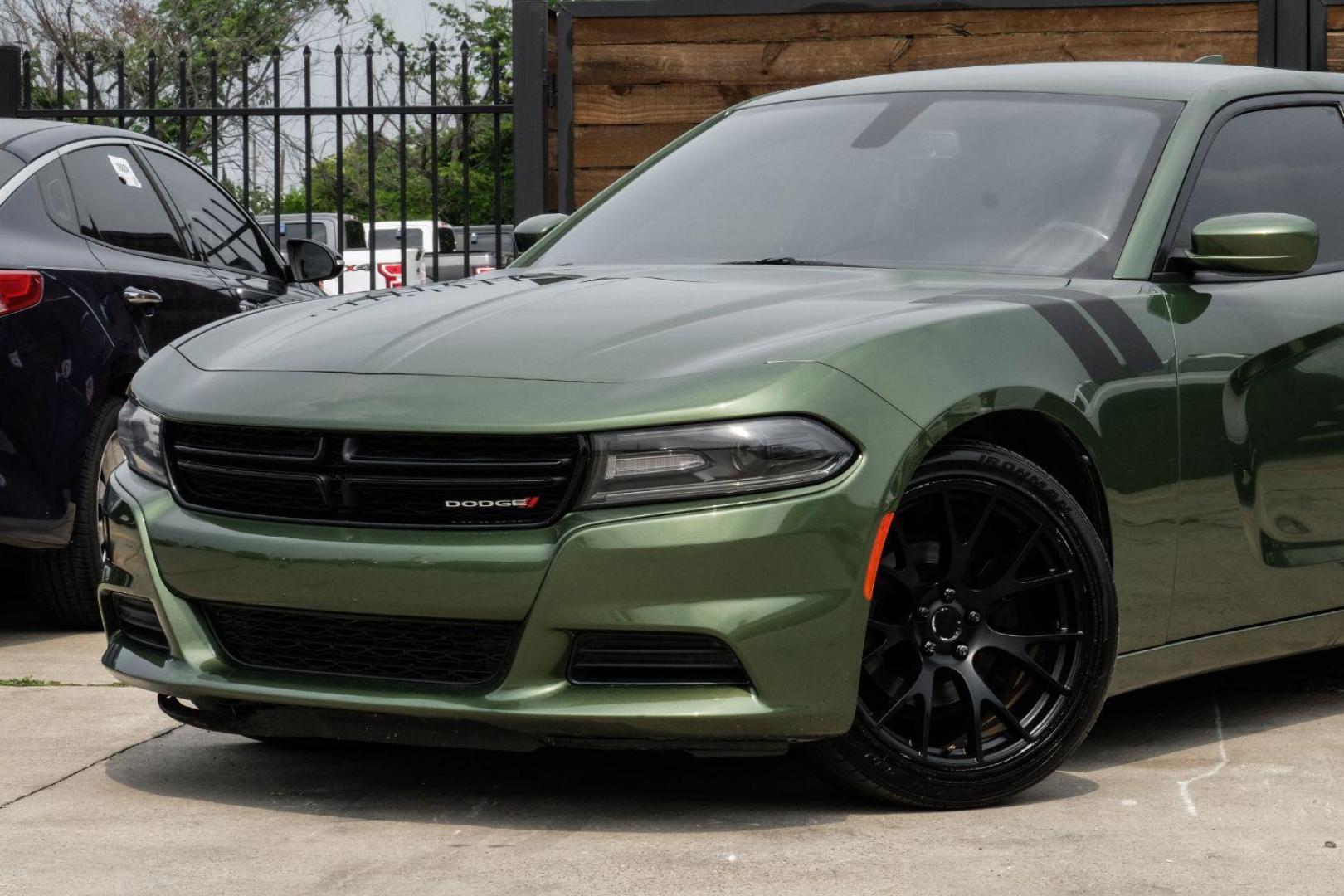 2019 Green Dodge Charger SXT (2C3CDXBG7KH) with an 3.6L V6 DOHC 24V engine, 8-Speed Automatic transmission, located at 2401 E Main St., Grand Prairie, TX, 75050, (972) 262-4440, 32.748981, -96.969643 - Photo#4