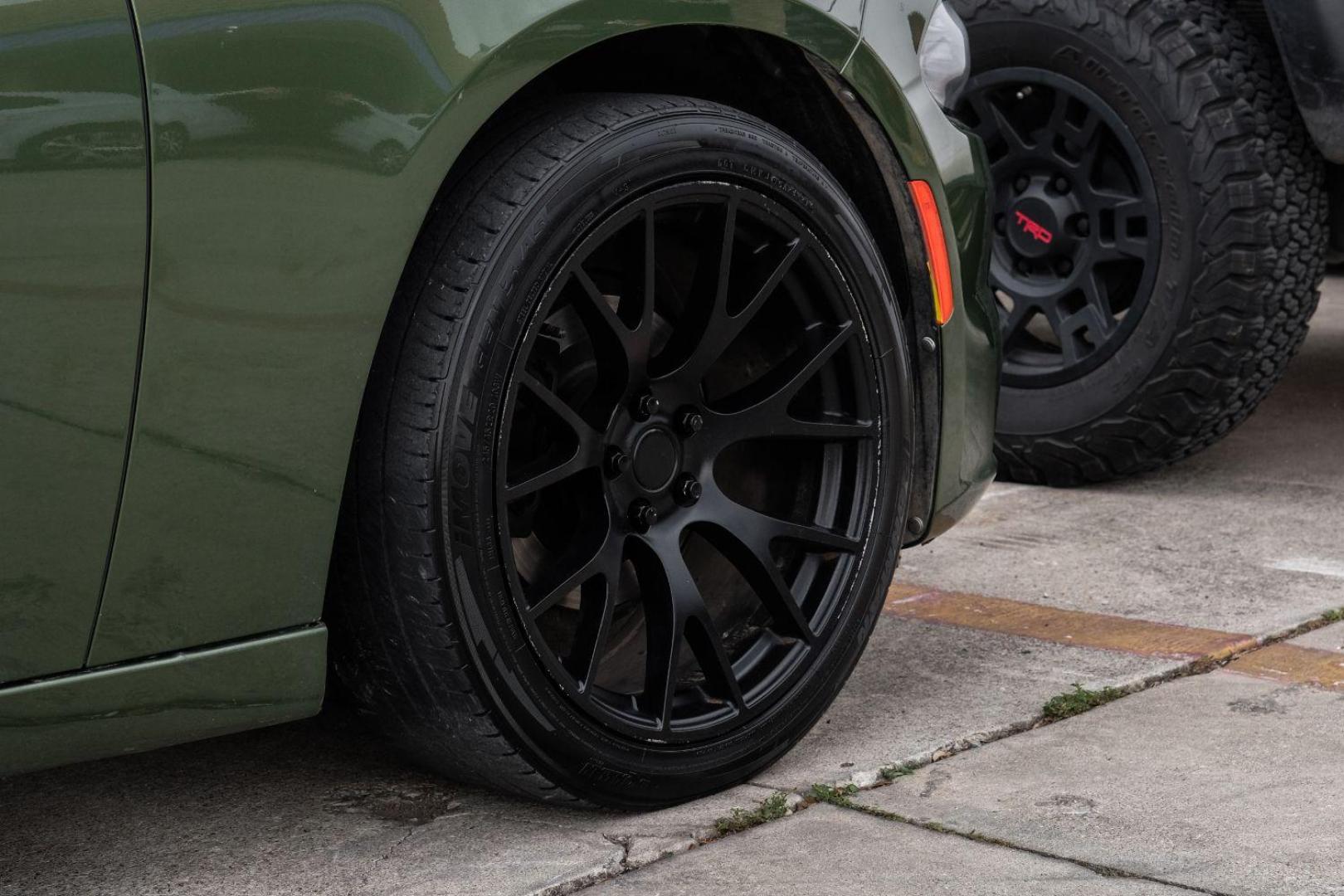 2019 Green Dodge Charger SXT (2C3CDXBG7KH) with an 3.6L V6 DOHC 24V engine, 8-Speed Automatic transmission, located at 2401 E Main St., Grand Prairie, TX, 75050, (972) 262-4440, 32.748981, -96.969643 - Photo#57