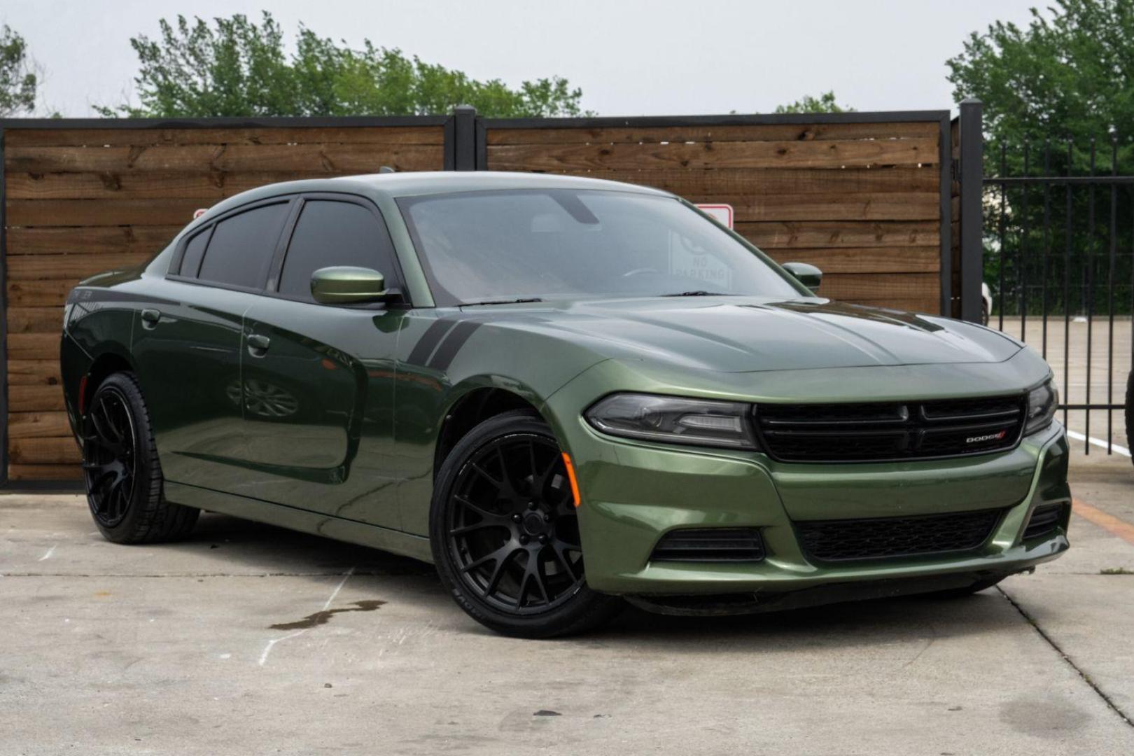 2019 Green Dodge Charger SXT (2C3CDXBG7KH) with an 3.6L V6 DOHC 24V engine, 8-Speed Automatic transmission, located at 2401 E Main St., Grand Prairie, TX, 75050, (972) 262-4440, 32.748981, -96.969643 - Photo#7