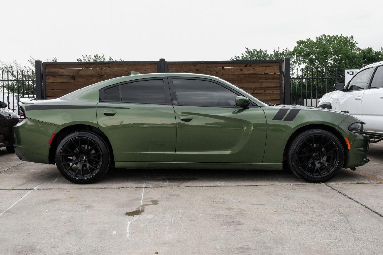 2019 Green Dodge Charger SXT (2C3CDXBG7KH) with an 3.6L V6 DOHC 24V engine, 8-Speed Automatic transmission, located at 2401 E Main St., Grand Prairie, TX, 75050, (972) 262-4440, 32.748981, -96.969643 - Photo#8