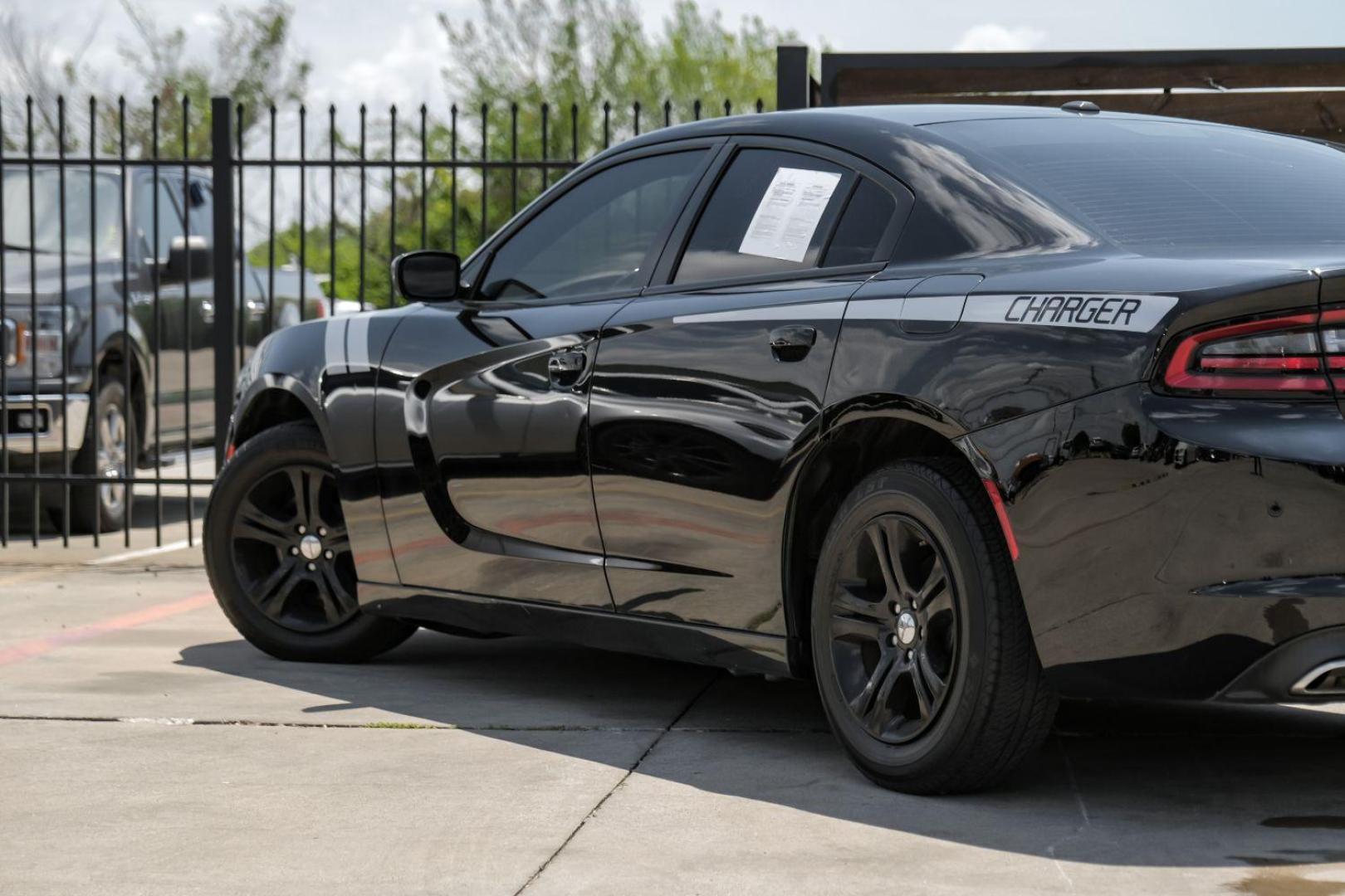 2019 Black Dodge Charger SXT (2C3CDXBG0KH) with an 3.6L V6 DOHC 24V engine, 8-Speed Automatic transmission, located at 2401 E Main St., Grand Prairie, TX, 75050, (972) 262-4440, 32.748981, -96.969643 - Photo#10