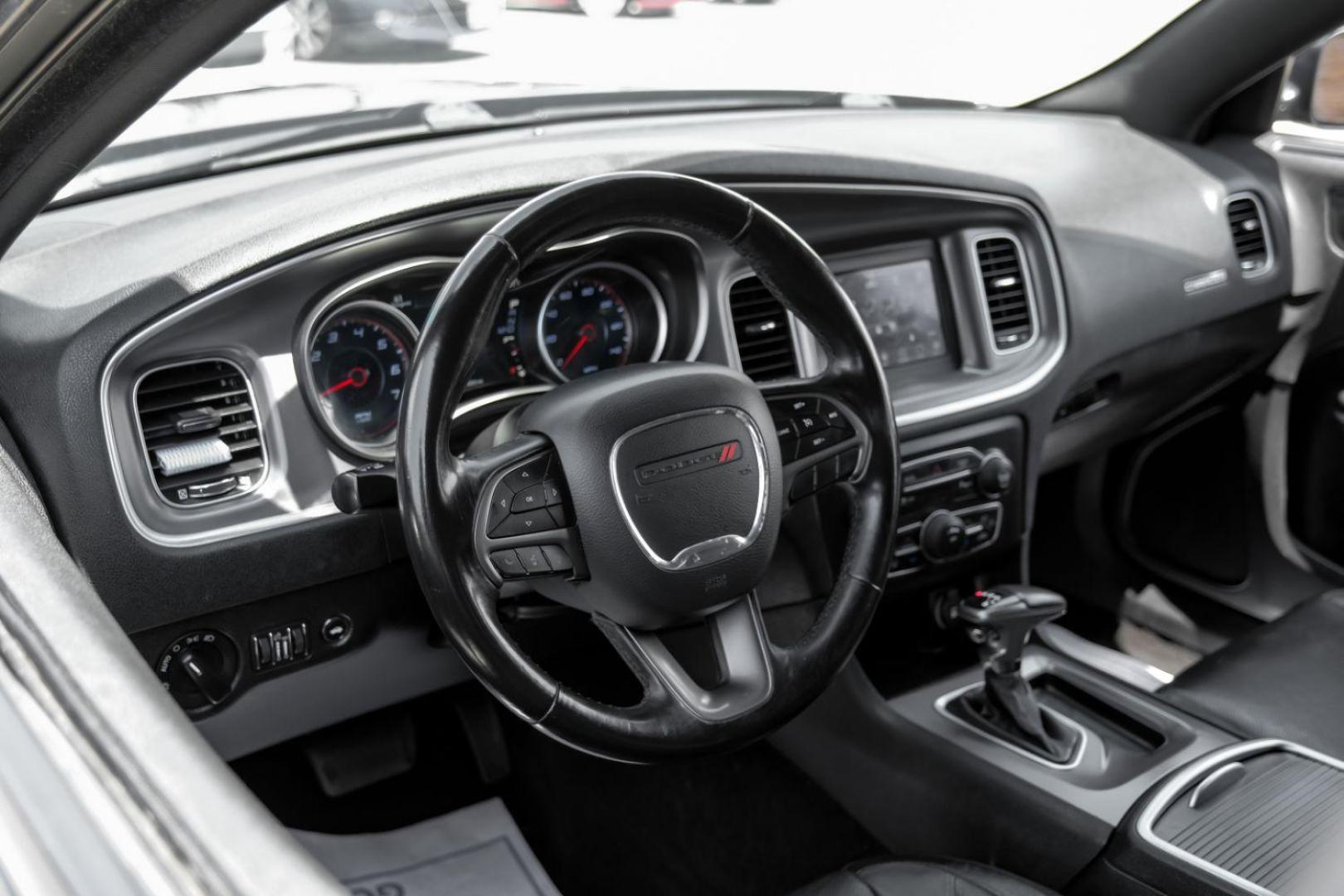 2019 Black Dodge Charger SXT (2C3CDXBG0KH) with an 3.6L V6 DOHC 24V engine, 8-Speed Automatic transmission, located at 2401 E Main St., Grand Prairie, TX, 75050, (972) 262-4440, 32.748981, -96.969643 - Photo#18