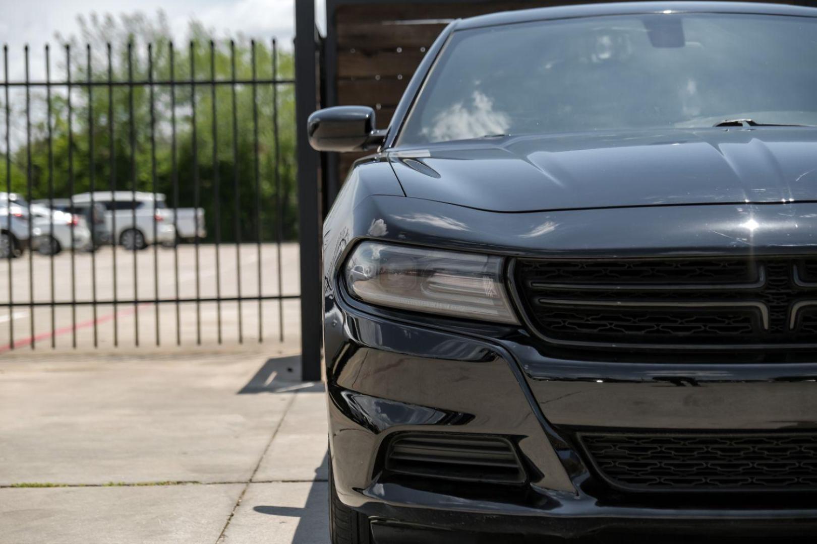 2019 Black Dodge Charger SXT (2C3CDXBG0KH) with an 3.6L V6 DOHC 24V engine, 8-Speed Automatic transmission, located at 2401 E Main St., Grand Prairie, TX, 75050, (972) 262-4440, 32.748981, -96.969643 - Photo#44