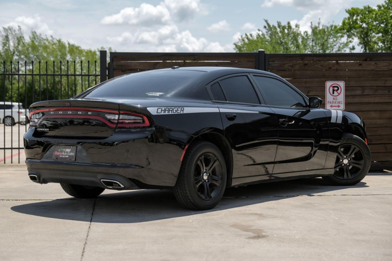 2019 Black Dodge Charger SXT (2C3CDXBG0KH) with an 3.6L V6 DOHC 24V engine, 8-Speed Automatic transmission, located at 2401 E Main St., Grand Prairie, TX, 75050, (972) 262-4440, 32.748981, -96.969643 - Photo#7