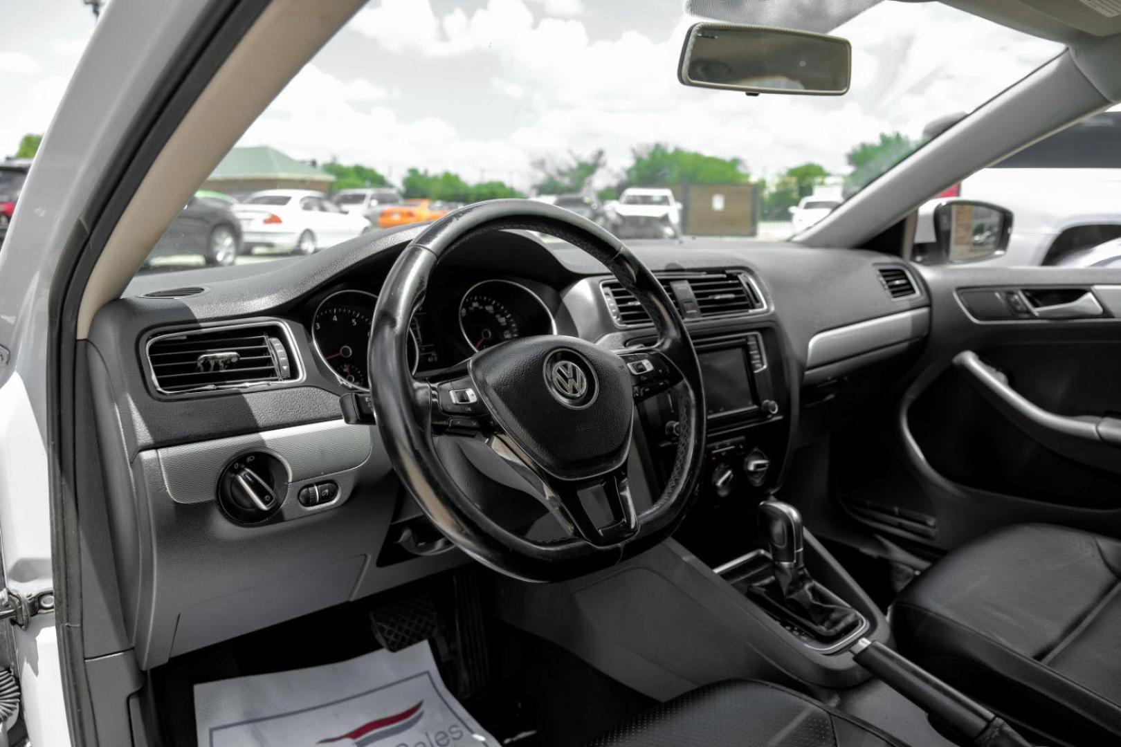 2017 white Volkswagen Jetta 1.4T SE 6A (3VWDB7AJ6HM) with an 1.4L L4 DOHC 16V engine, 6-Speed Automatic transmission, located at 2401 E Main St., Grand Prairie, TX, 75050, (972) 262-4440, 32.748981, -96.969643 - Photo#2