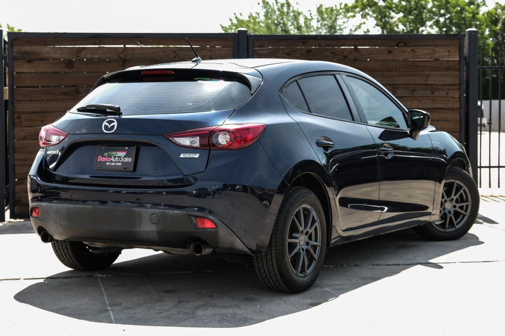 2015 BLACK Mazda MAZDA3 i Sport MT 5-Door (3MZBM1K79FM) with an 2.0L L4 DOHC 16V engine, 6-Speed Manual transmission, located at 2401 E Main St., Grand Prairie, TX, 75050, (972) 262-4440, 32.748981, -96.969643 - Photo#11