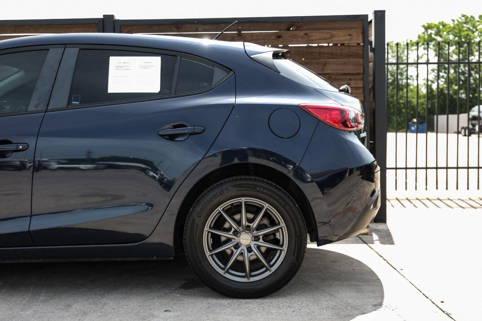 2015 BLACK Mazda MAZDA3 i Sport MT 5-Door (3MZBM1K79FM) with an 2.0L L4 DOHC 16V engine, 6-Speed Manual transmission, located at 2401 E Main St., Grand Prairie, TX, 75050, (972) 262-4440, 32.748981, -96.969643 - Photo#18