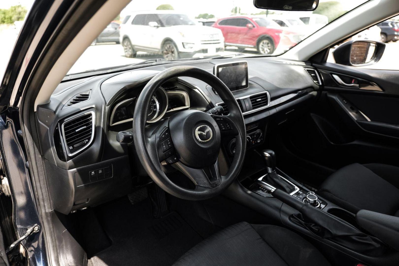 2015 BLACK Mazda MAZDA3 i Sport MT 5-Door (3MZBM1K79FM) with an 2.0L L4 DOHC 16V engine, 6-Speed Manual transmission, located at 2401 E Main St., Grand Prairie, TX, 75050, (972) 262-4440, 32.748981, -96.969643 - Photo#2