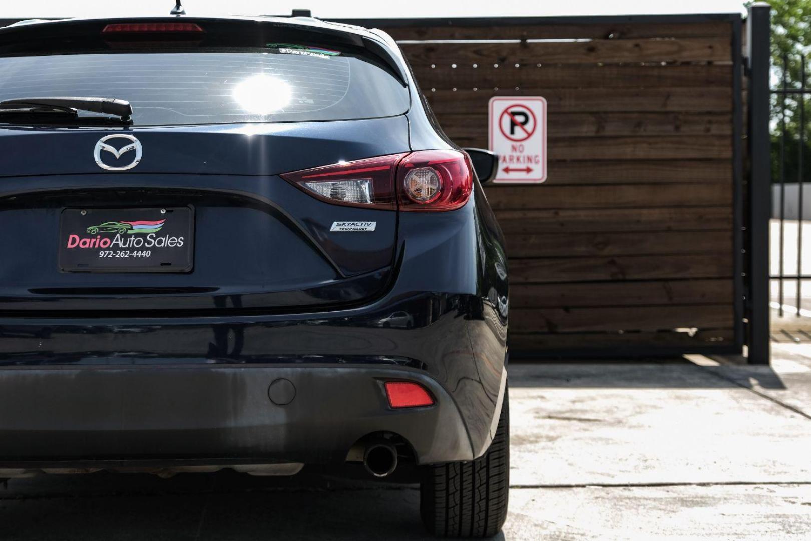 2015 BLACK Mazda MAZDA3 i Sport MT 5-Door (3MZBM1K79FM) with an 2.0L L4 DOHC 16V engine, 6-Speed Manual transmission, located at 2401 E Main St., Grand Prairie, TX, 75050, (972) 262-4440, 32.748981, -96.969643 - Photo#53