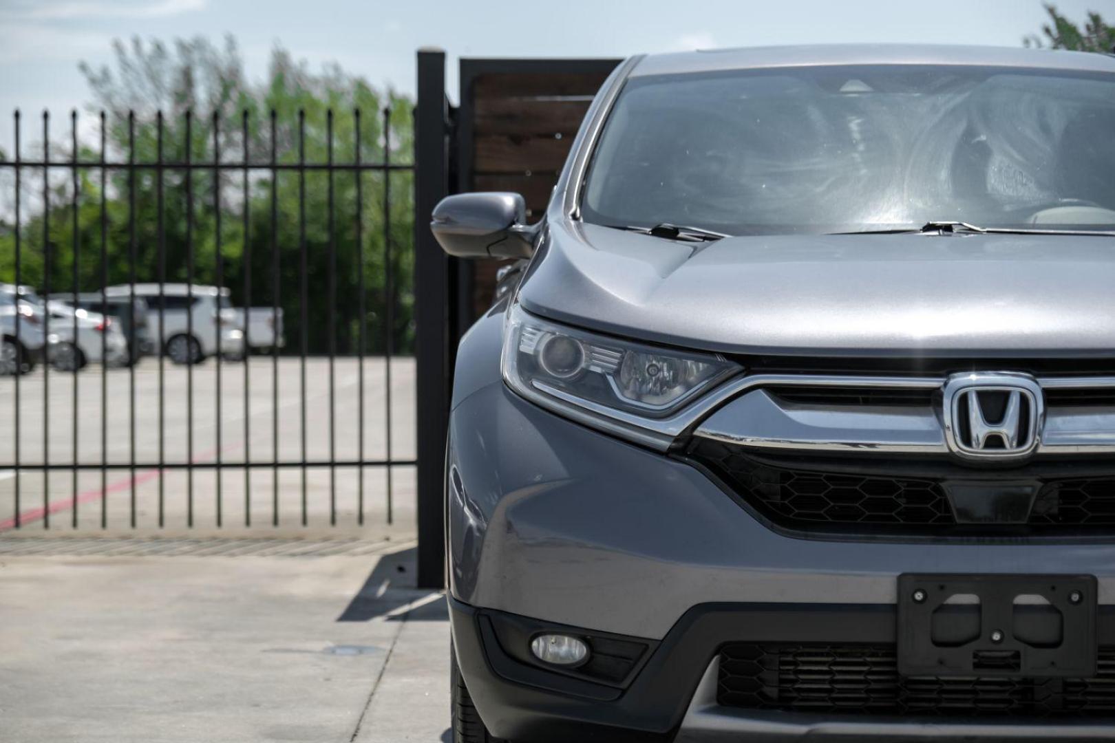 2017 GRAY Honda CR-V SPORT UTILITY 4-DR (5J6RW2H50HL) with an 1.5L L4 16V DOHC TURBO engine, Continuously Variable Transmission transmission, located at 2401 E Main St., Grand Prairie, TX, 75050, (972) 262-4440, 32.748981, -96.969643 - Photo#47