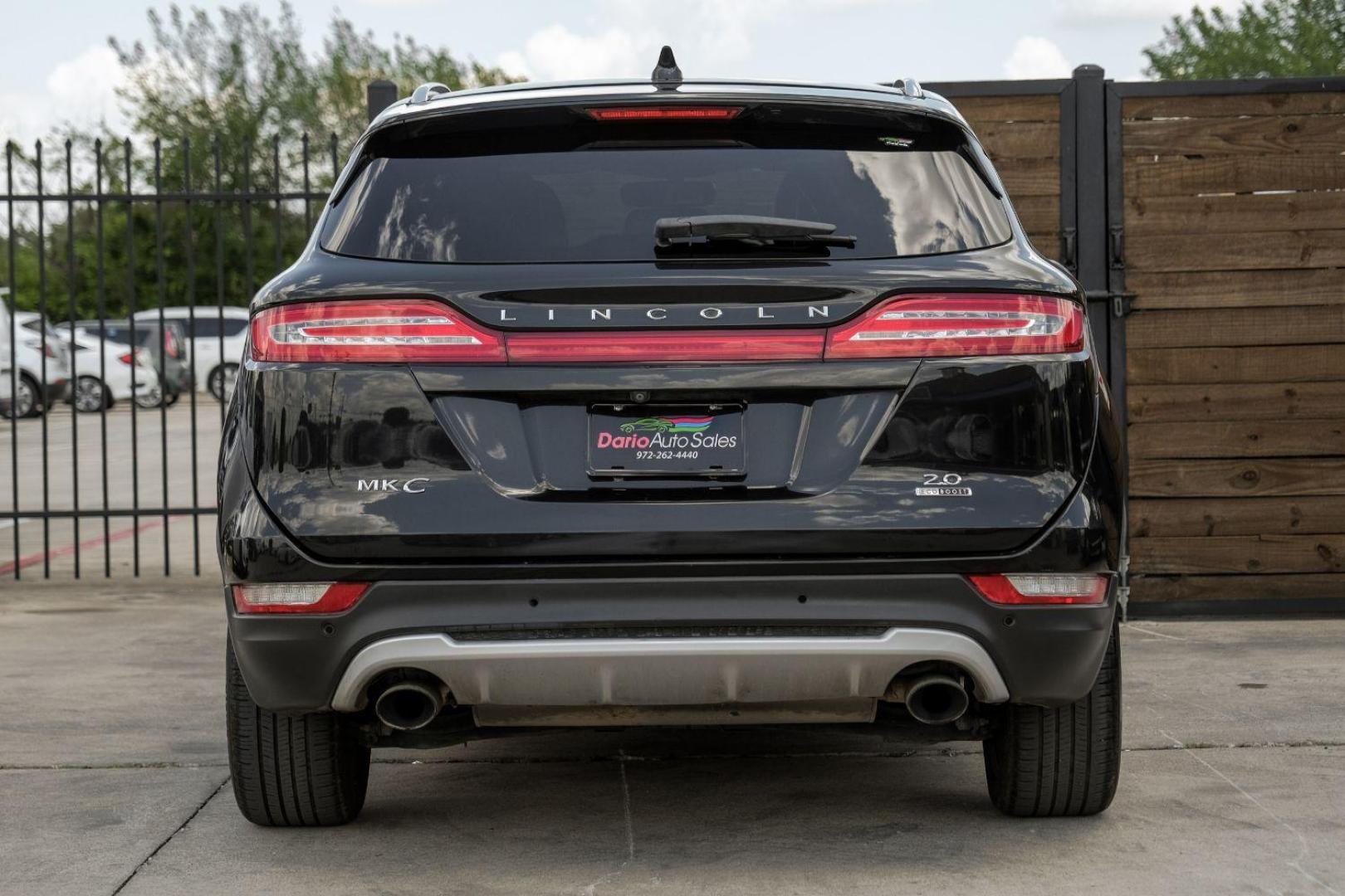 2015 black Lincoln MKC FWD (5LMCJ1A9XFU) with an 2.0L L4 DOHC 16V engine, 6-Speed Automatic transmission, located at 2401 E Main St., Grand Prairie, TX, 75050, (972) 262-4440, 32.748981, -96.969643 - Photo#9