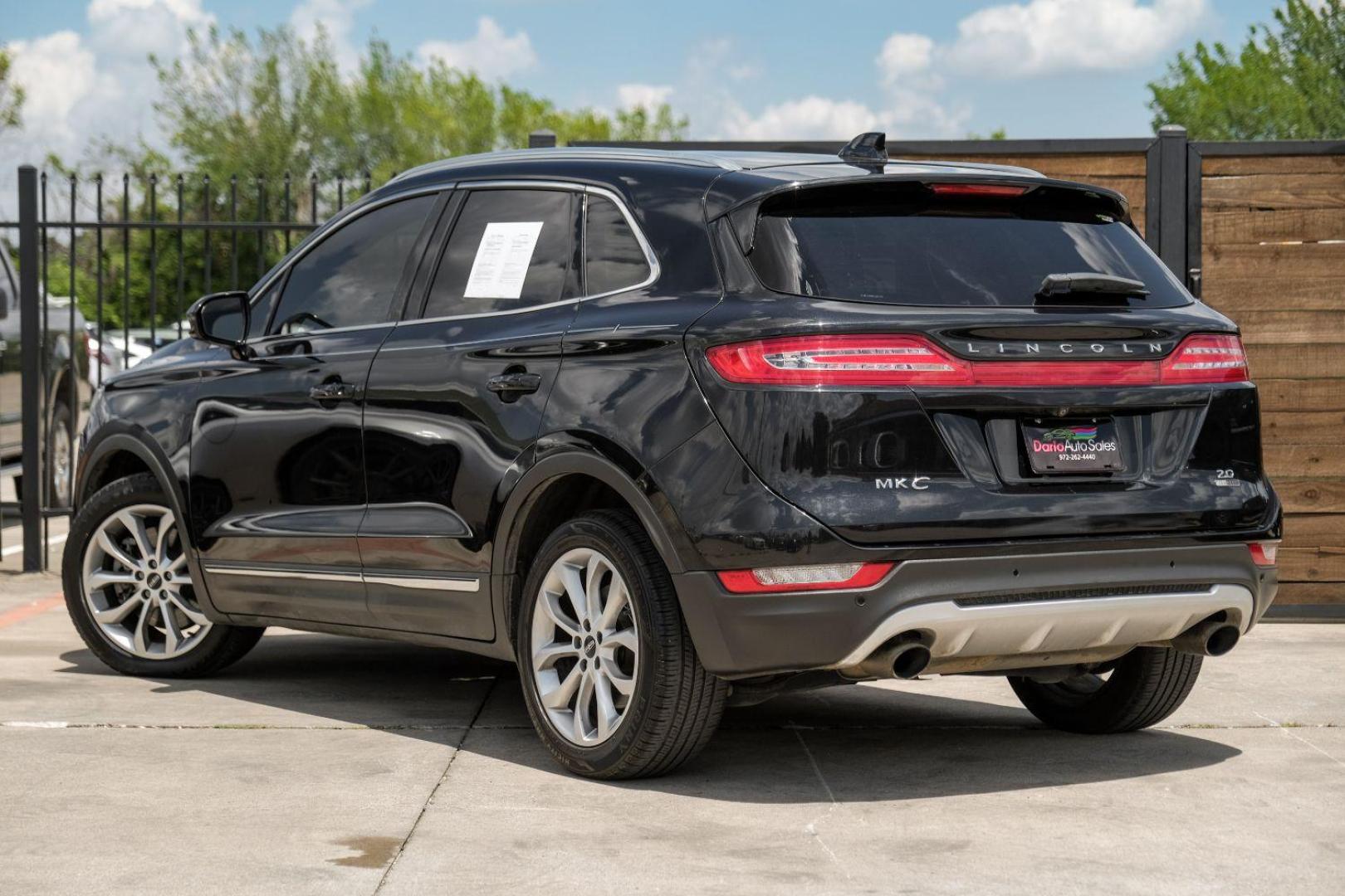 2015 black Lincoln MKC FWD (5LMCJ1A9XFU) with an 2.0L L4 DOHC 16V engine, 6-Speed Automatic transmission, located at 2401 E Main St., Grand Prairie, TX, 75050, (972) 262-4440, 32.748981, -96.969643 - Photo#10