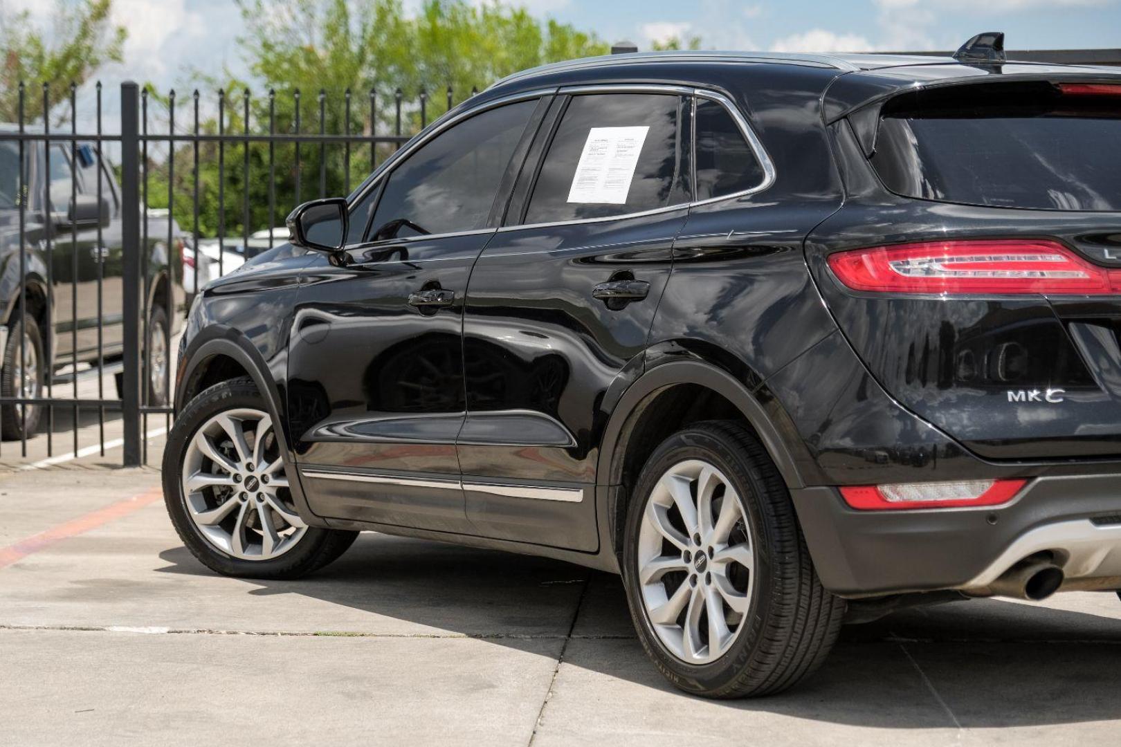 2015 black Lincoln MKC FWD (5LMCJ1A9XFU) with an 2.0L L4 DOHC 16V engine, 6-Speed Automatic transmission, located at 2401 E Main St., Grand Prairie, TX, 75050, (972) 262-4440, 32.748981, -96.969643 - Photo#11